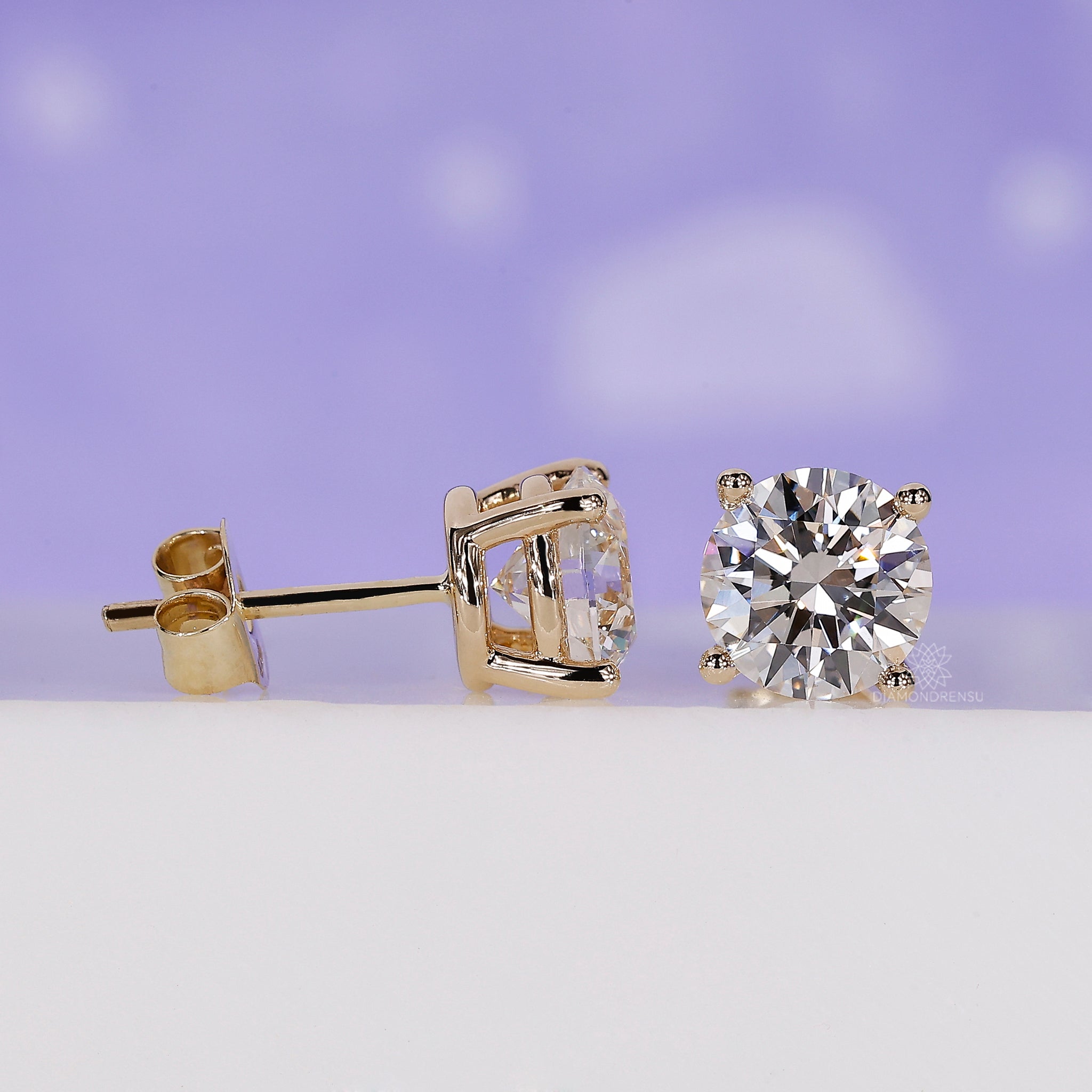 Diamondrensu UK yellow gold earrings.