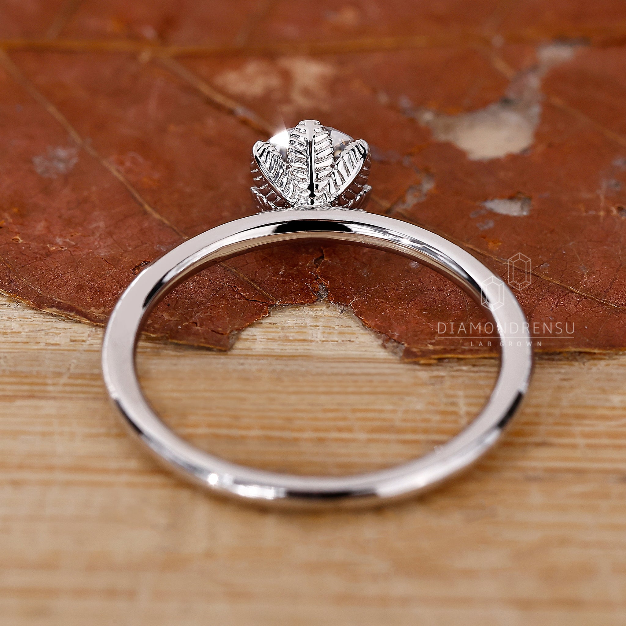 UK engagement ring created with nature inspired ring style.
