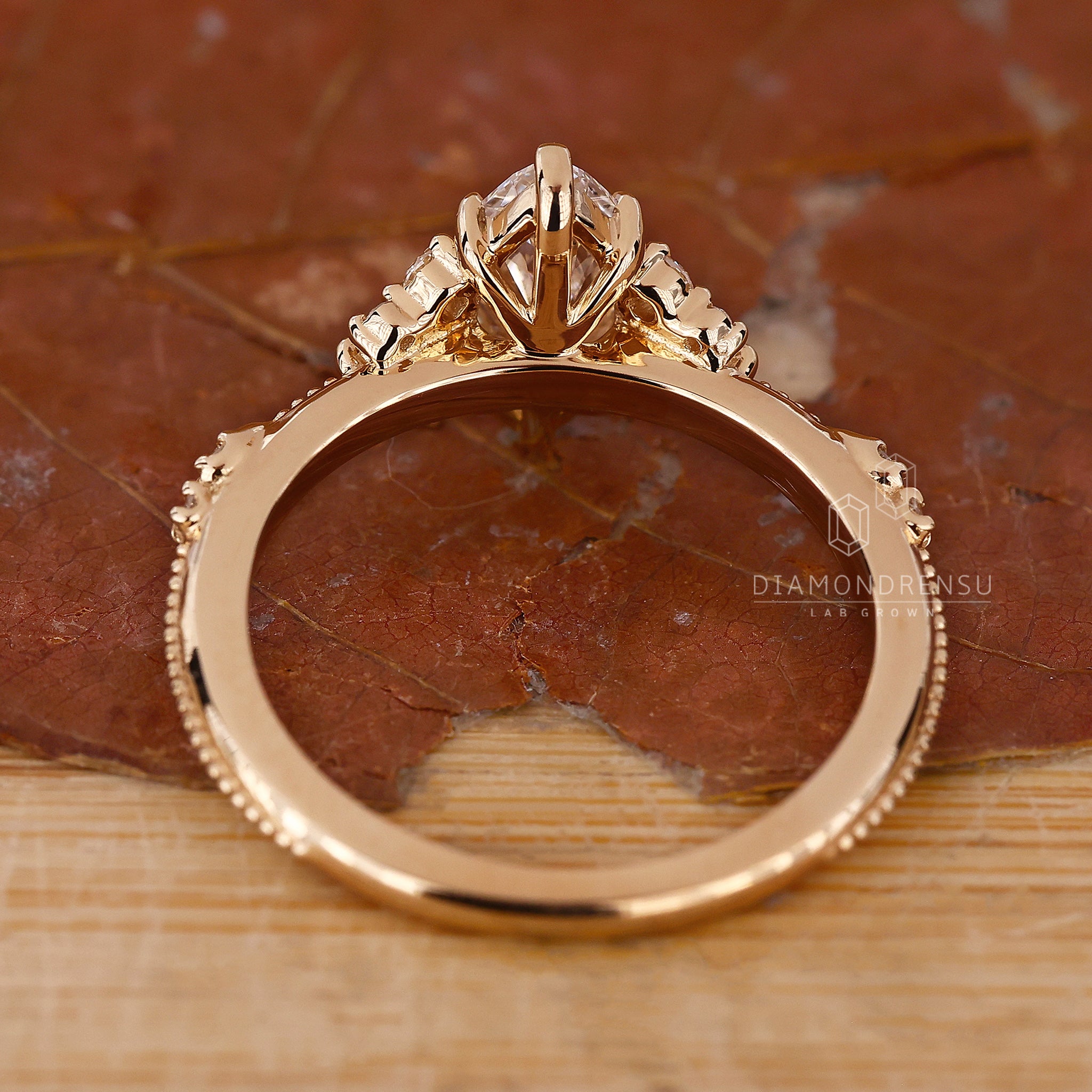 Buy engagement ring in UK with marquise cut cluster.

