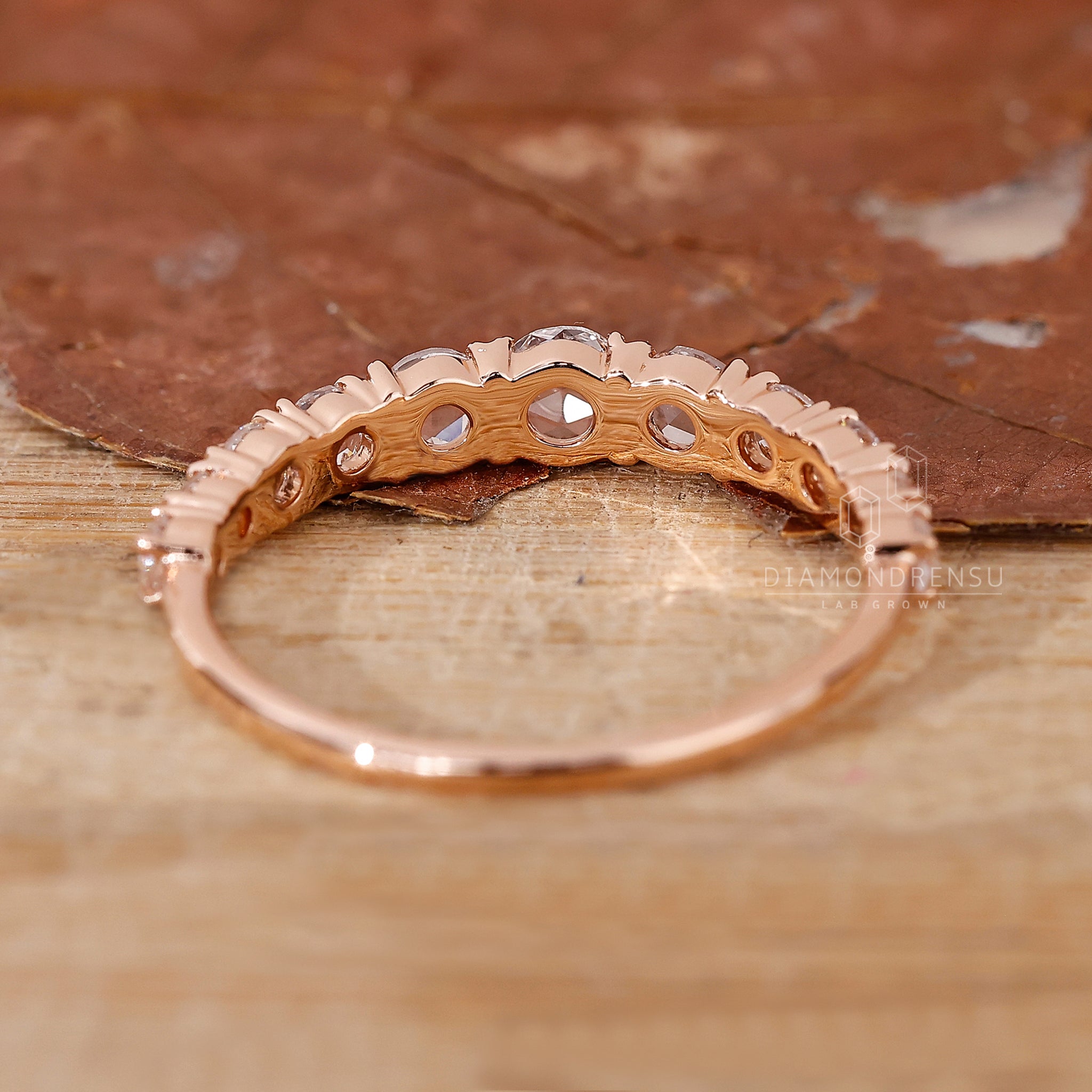 Elegant half eternity rose gold wedding ring.
