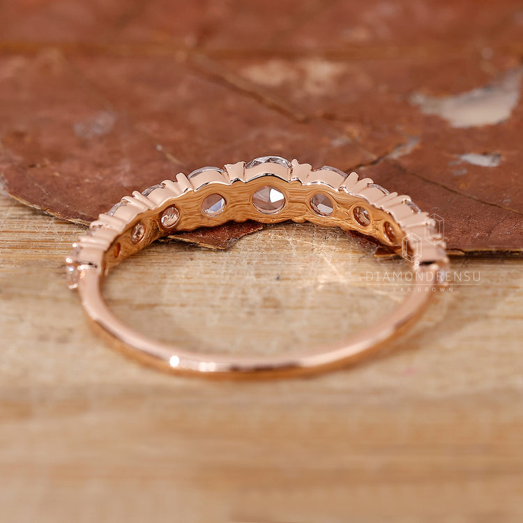 Elegant half eternity rose gold wedding ring.
