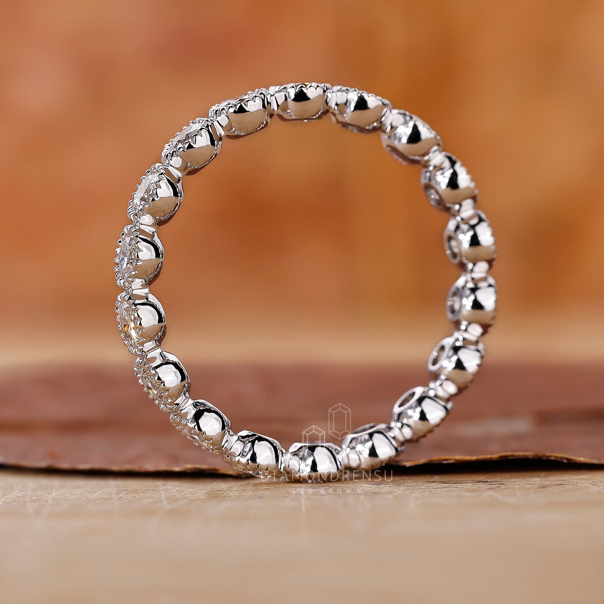 Diamondrensu UK bezel set wedding band.
