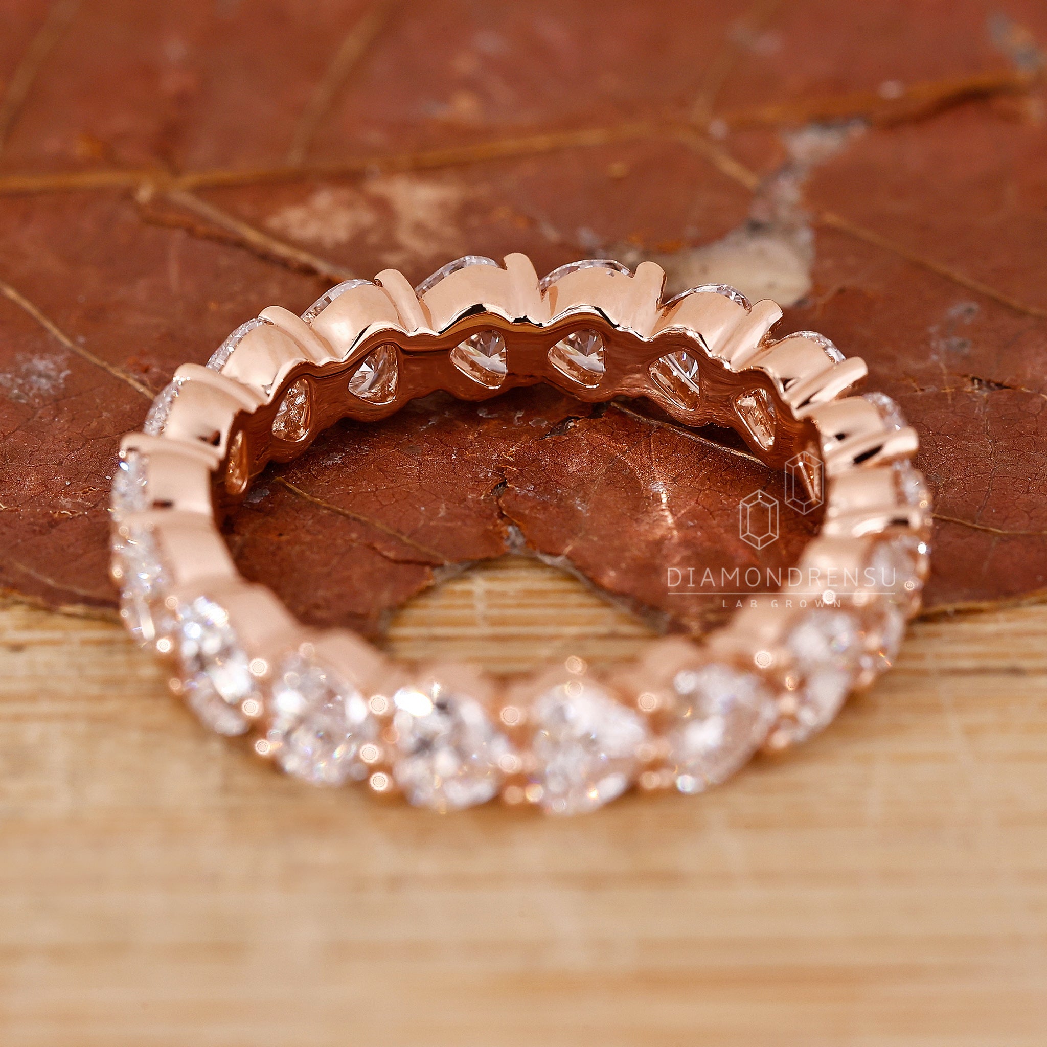 Lab diamond eternity band with heart cuts.
