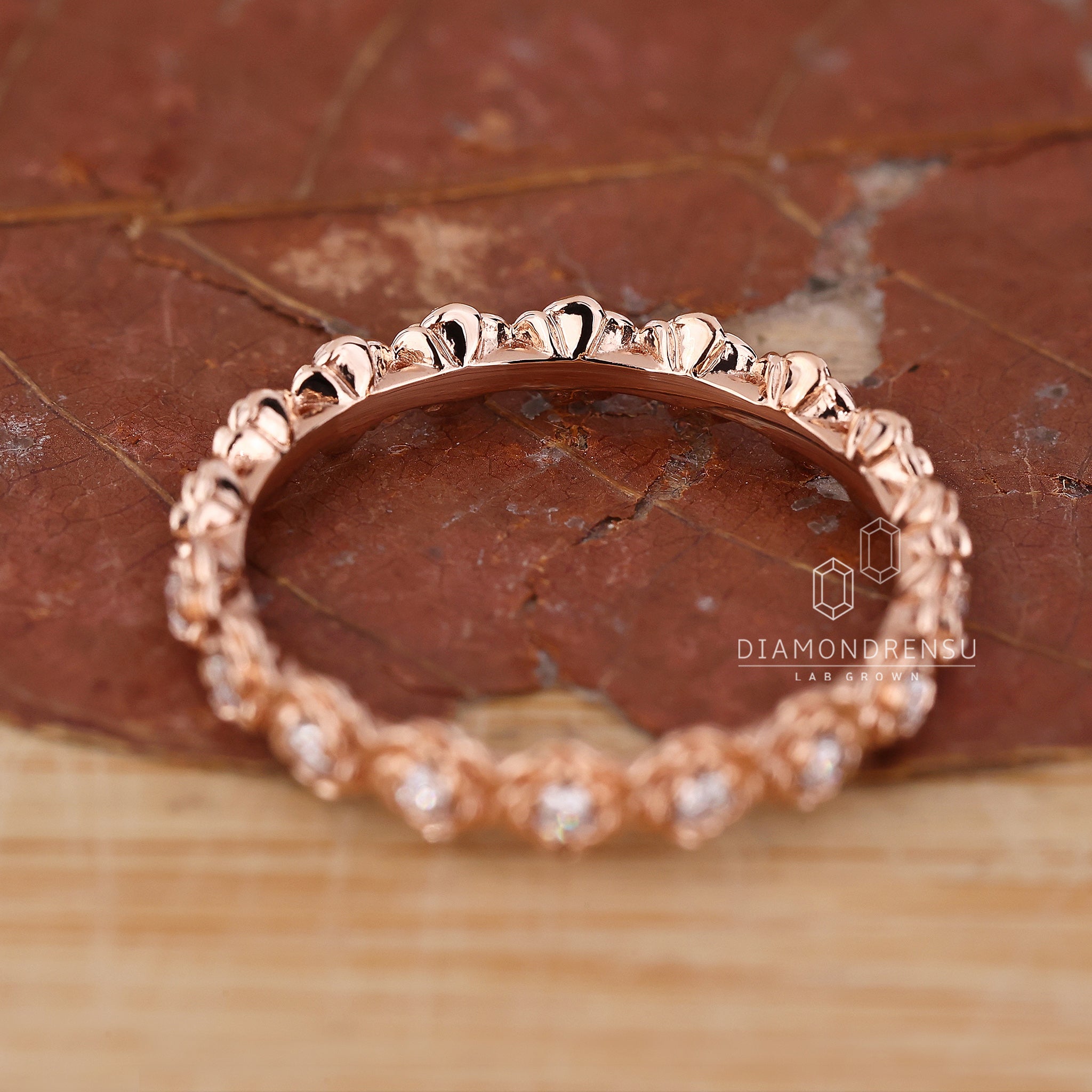 Diamond eternity band with round diamond
