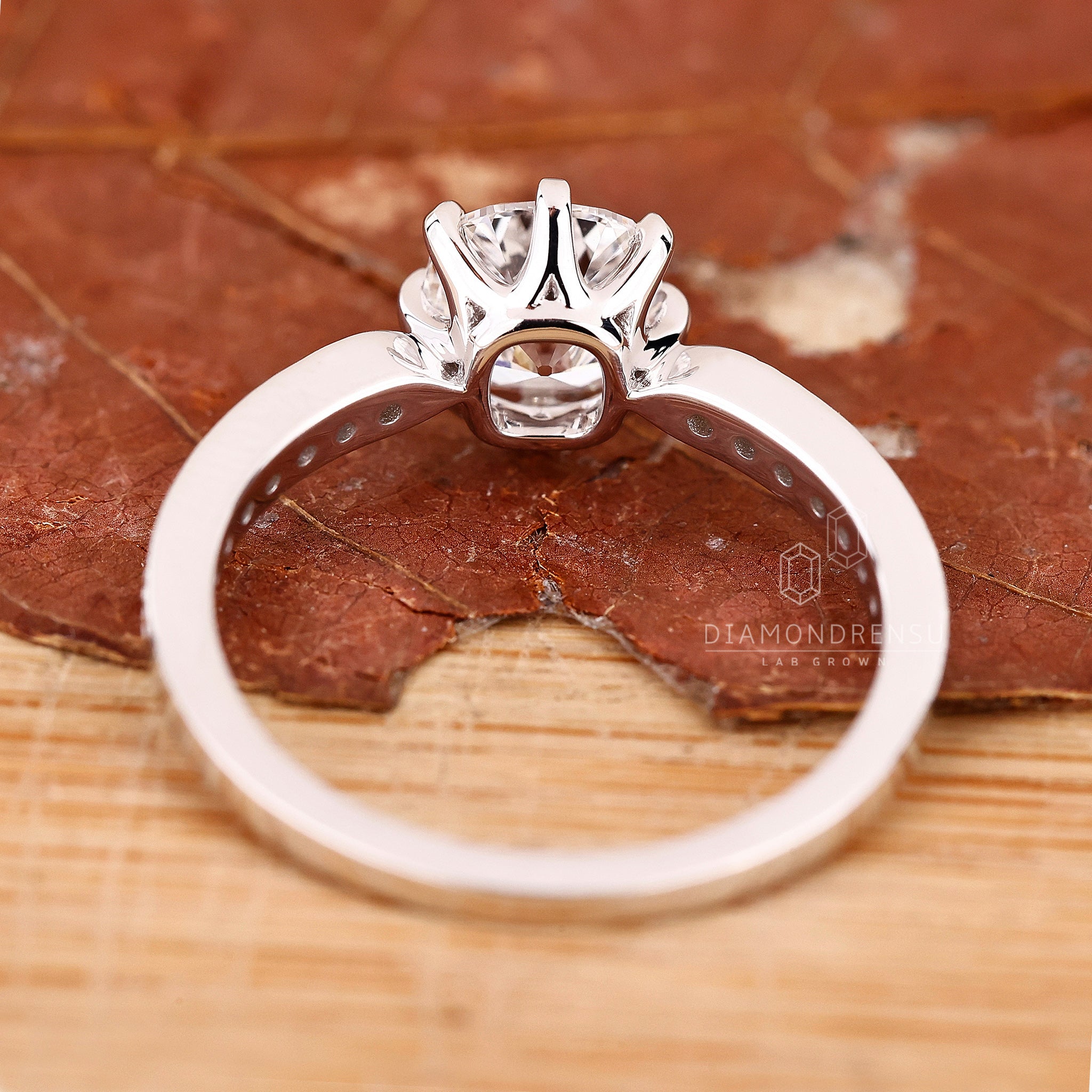 Buy engagement ring with IGI certified lab diamond and claw prong ring setting.
