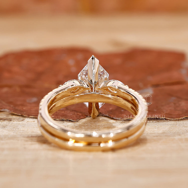 Open gap yellow gold wedding band.
