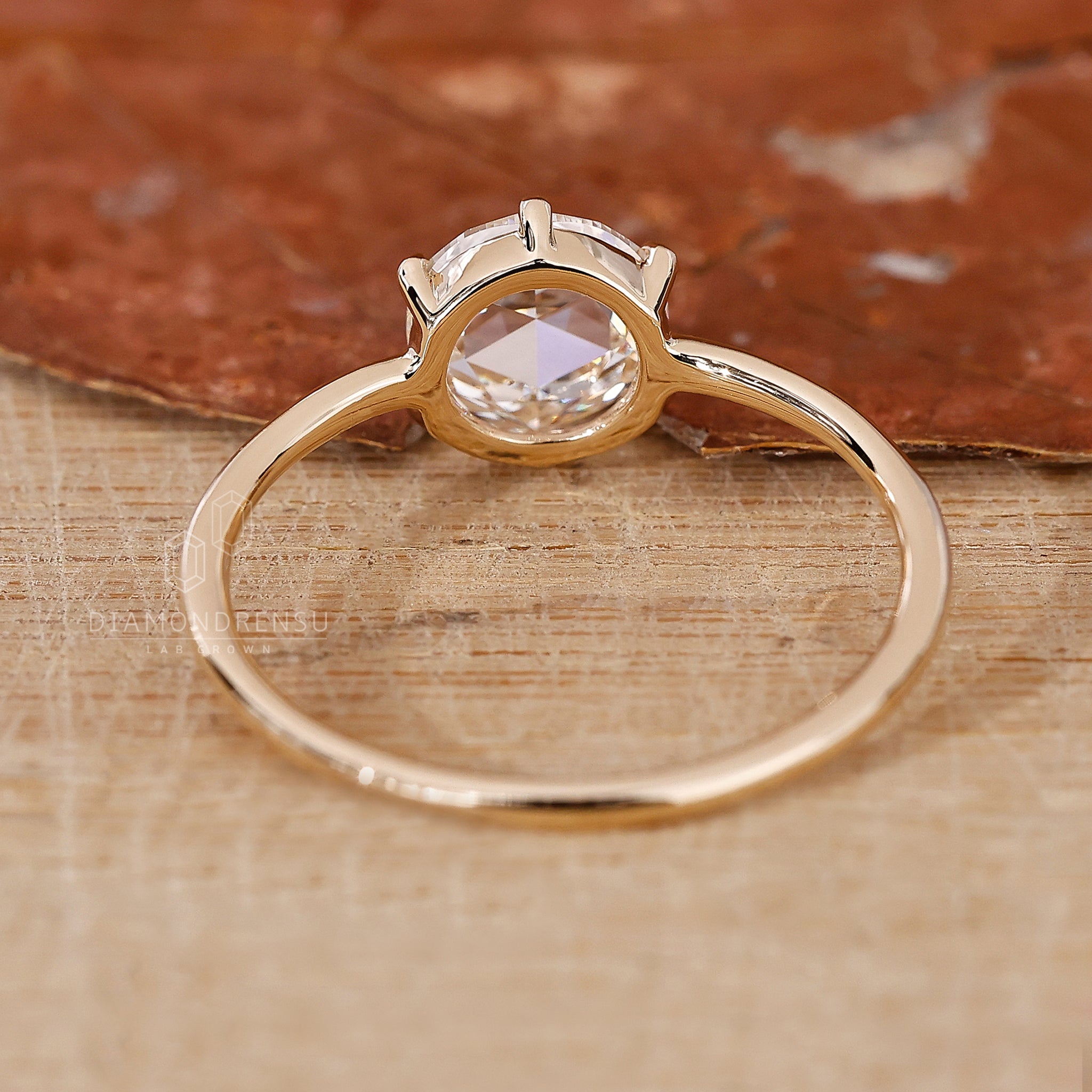 Lab grown diamond engagement ring in yellow gold.
