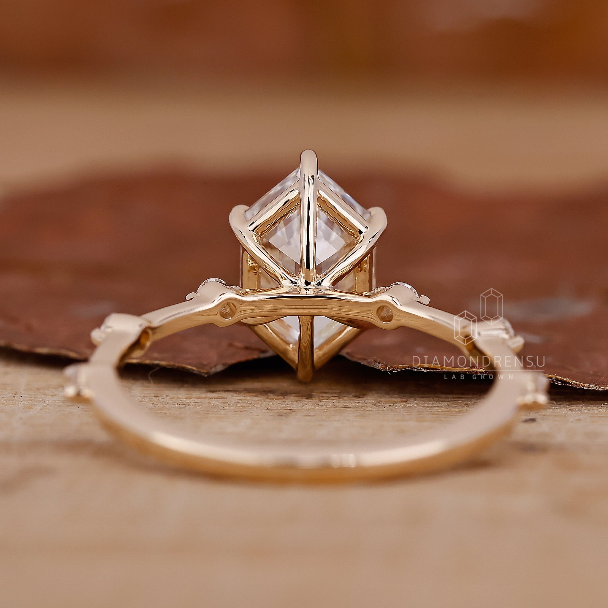 Handmade jewellery showcasing round cut pave engagement ring.
