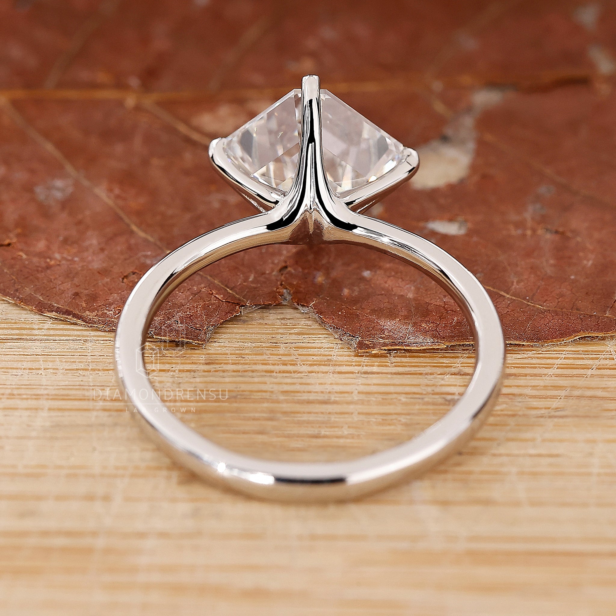 Lab Grown Diamond is used in this white gold asscher cut diamond ring.
