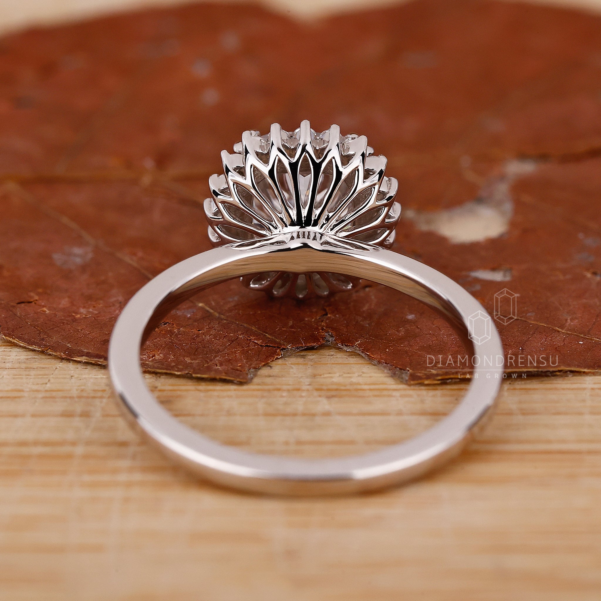 Cushion cut diamond ring with prong setting
