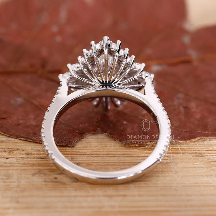 Diamondrensu UK engagement ring with round diamond pave band.
