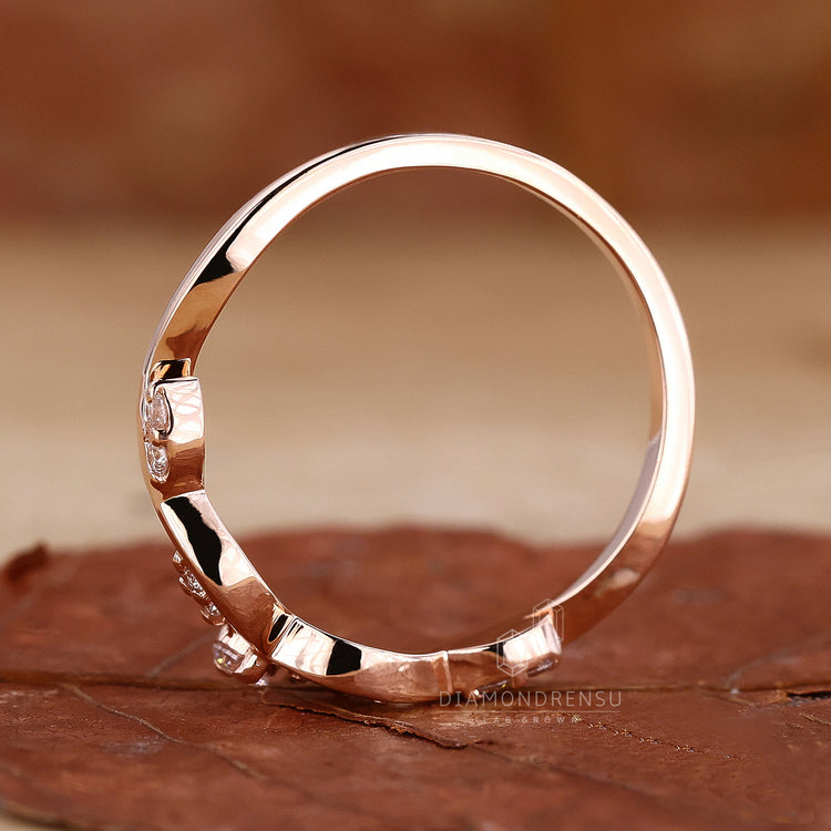 Tiara wedding ring with round diamonds.
