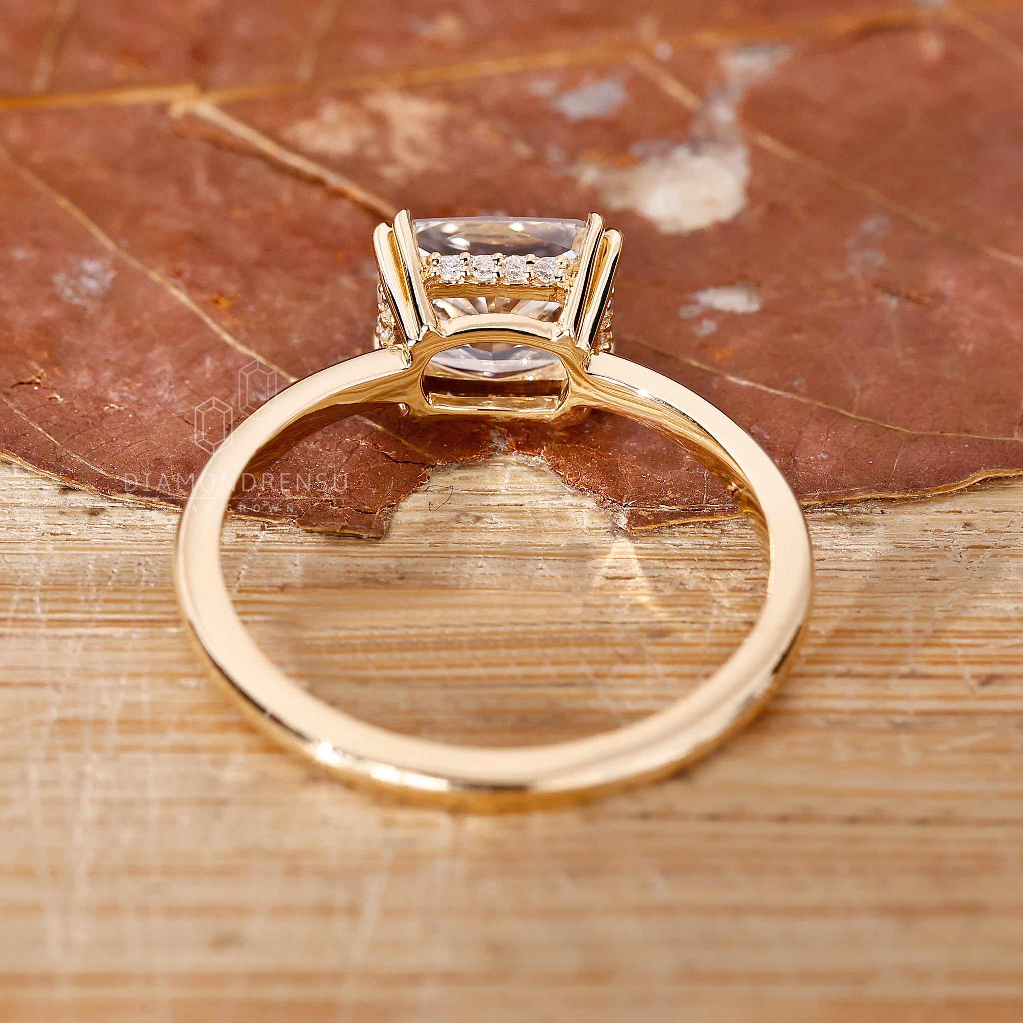 Handmade engagement ring with double claw prong setting.
