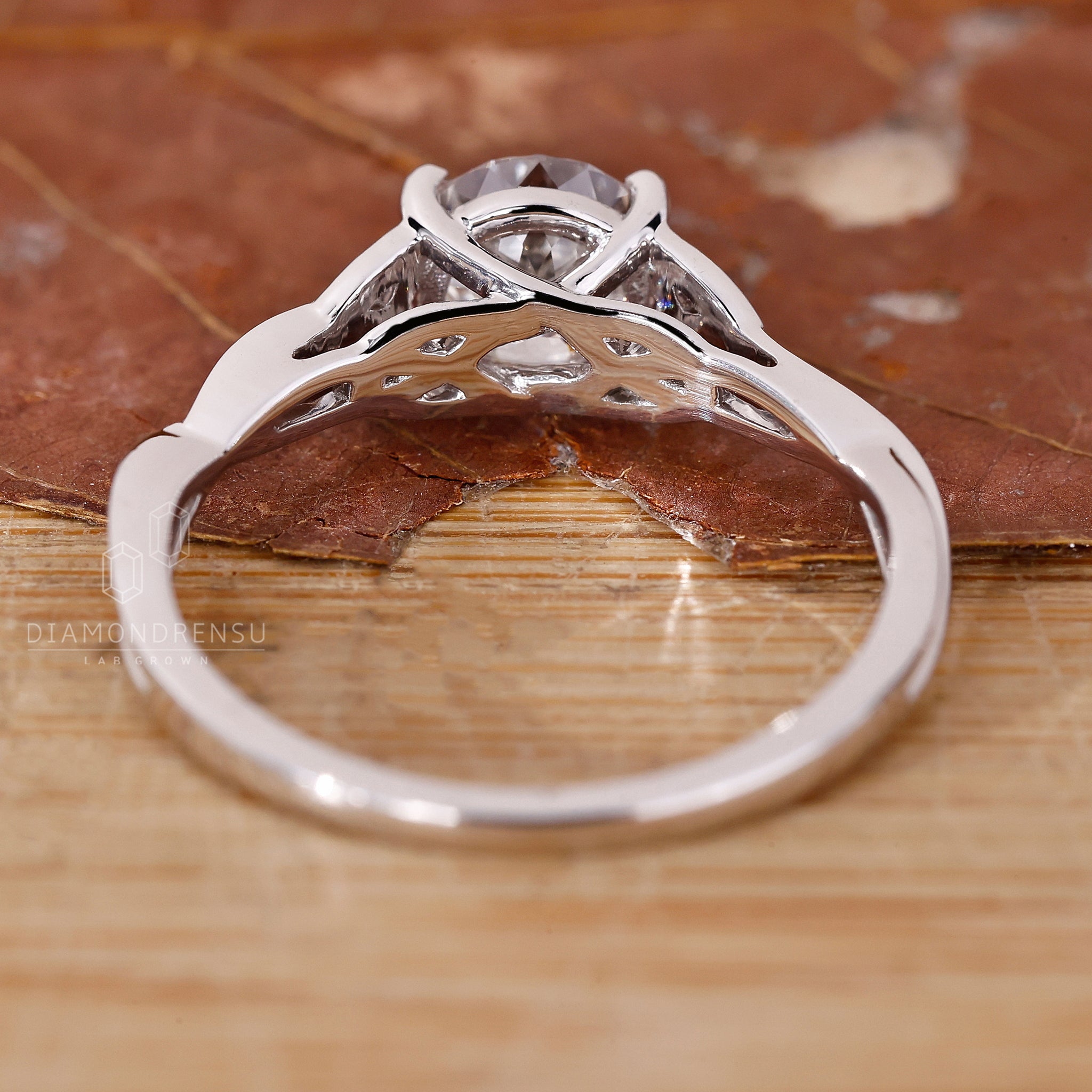 UK engagement ring with Portuguese cut centre stone.
