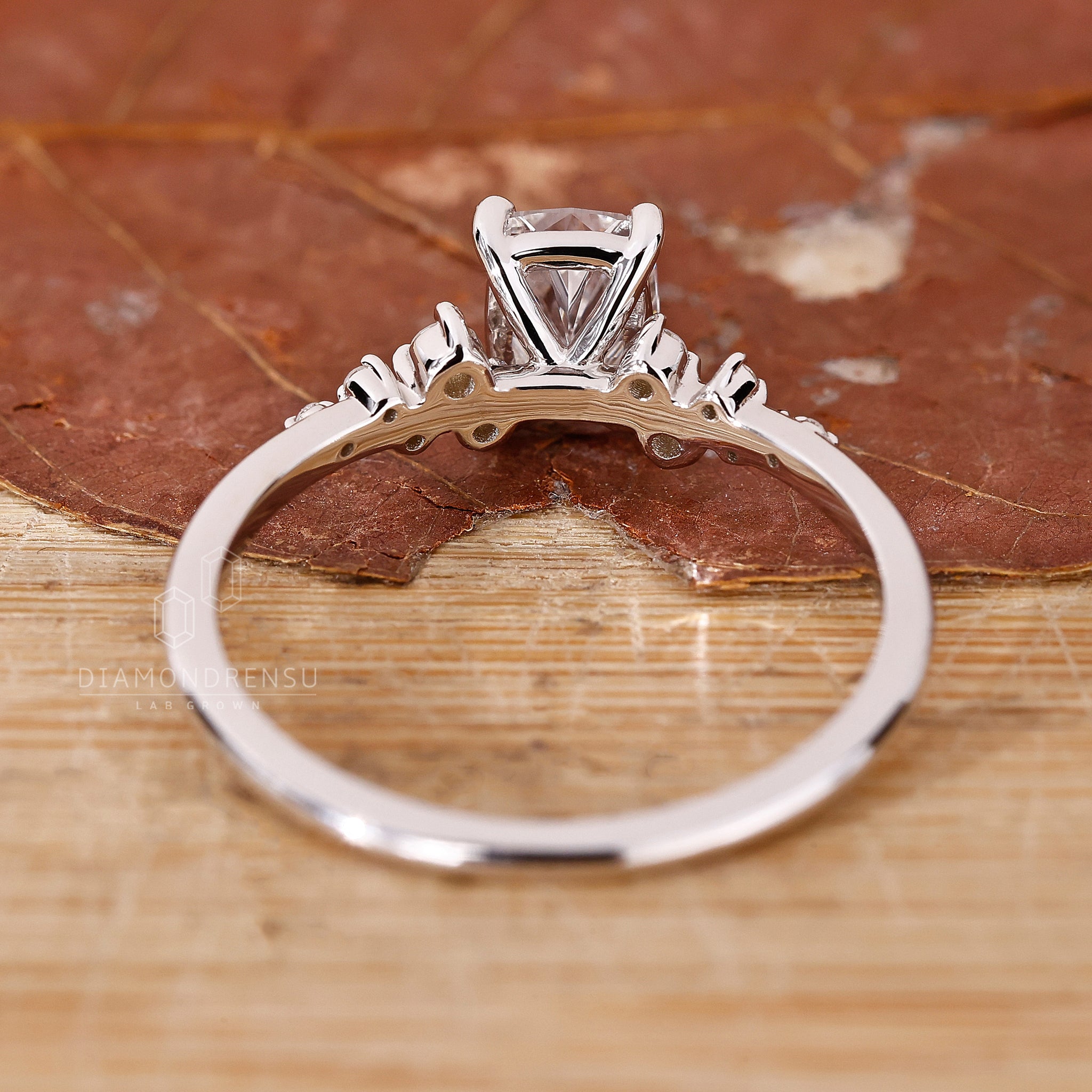 Lab grown diamond ring with unique cushion cut and prong setting.
