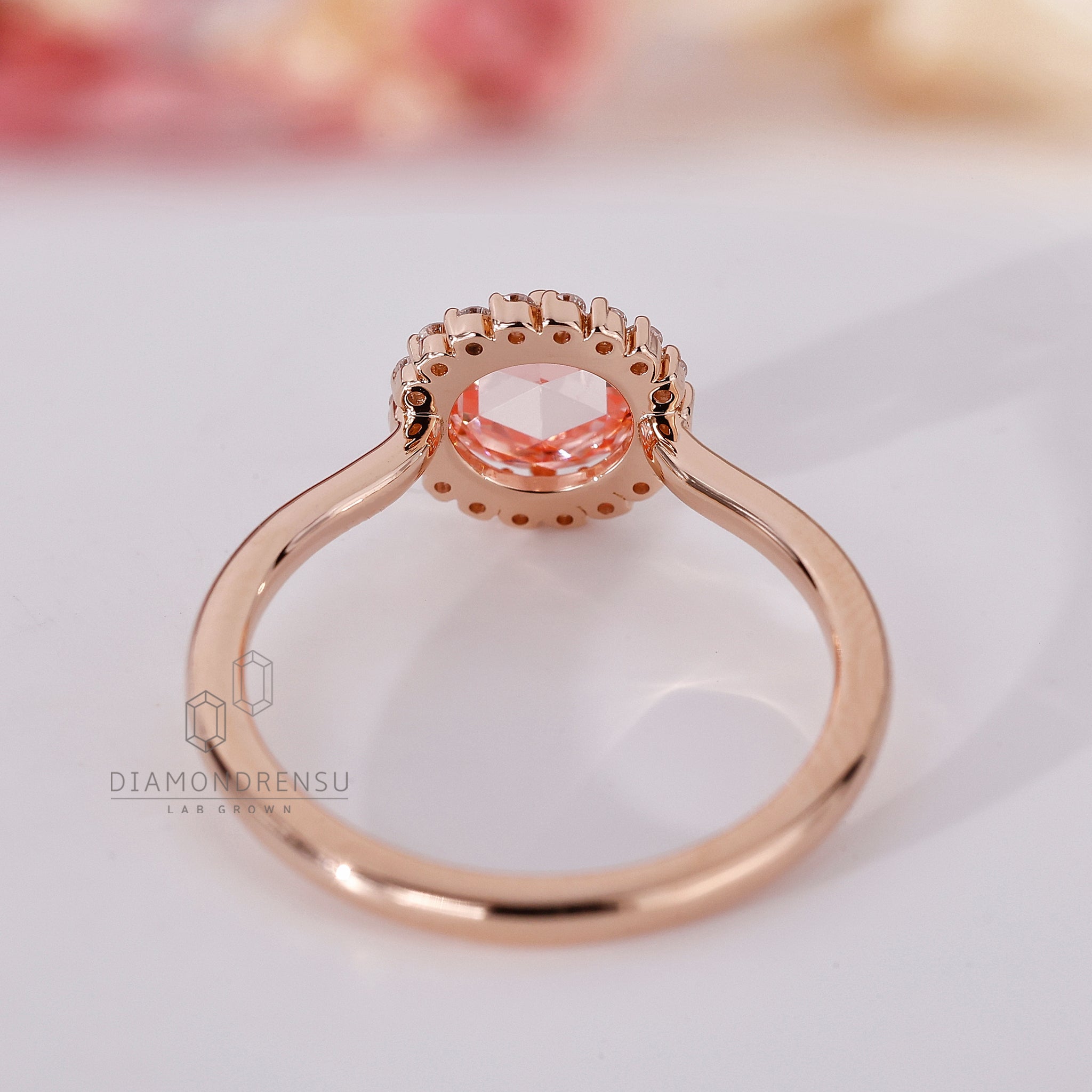Round Rose Cut Diamond Ring in halo engagement ring setting
