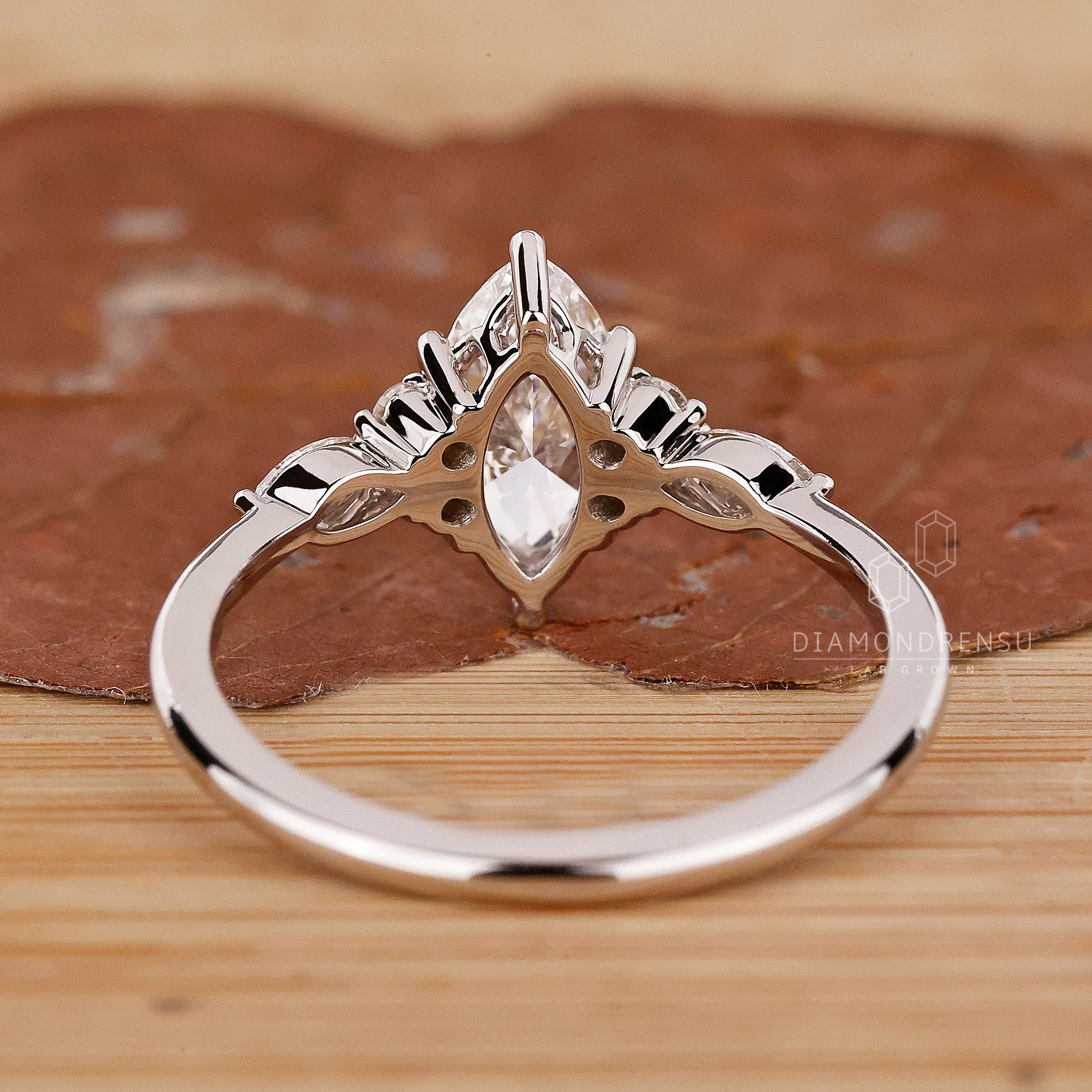 UK engagement ring featuring elegant muse setting.

