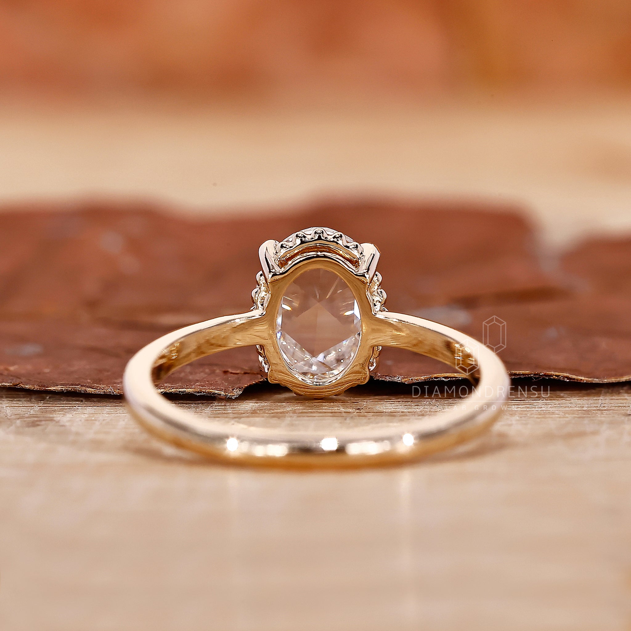 Prong setting on oval rose cut diamond ring
