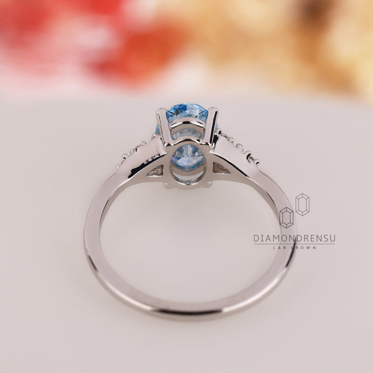 IGI certified oval diamond ring in muse setting with custom detail.
