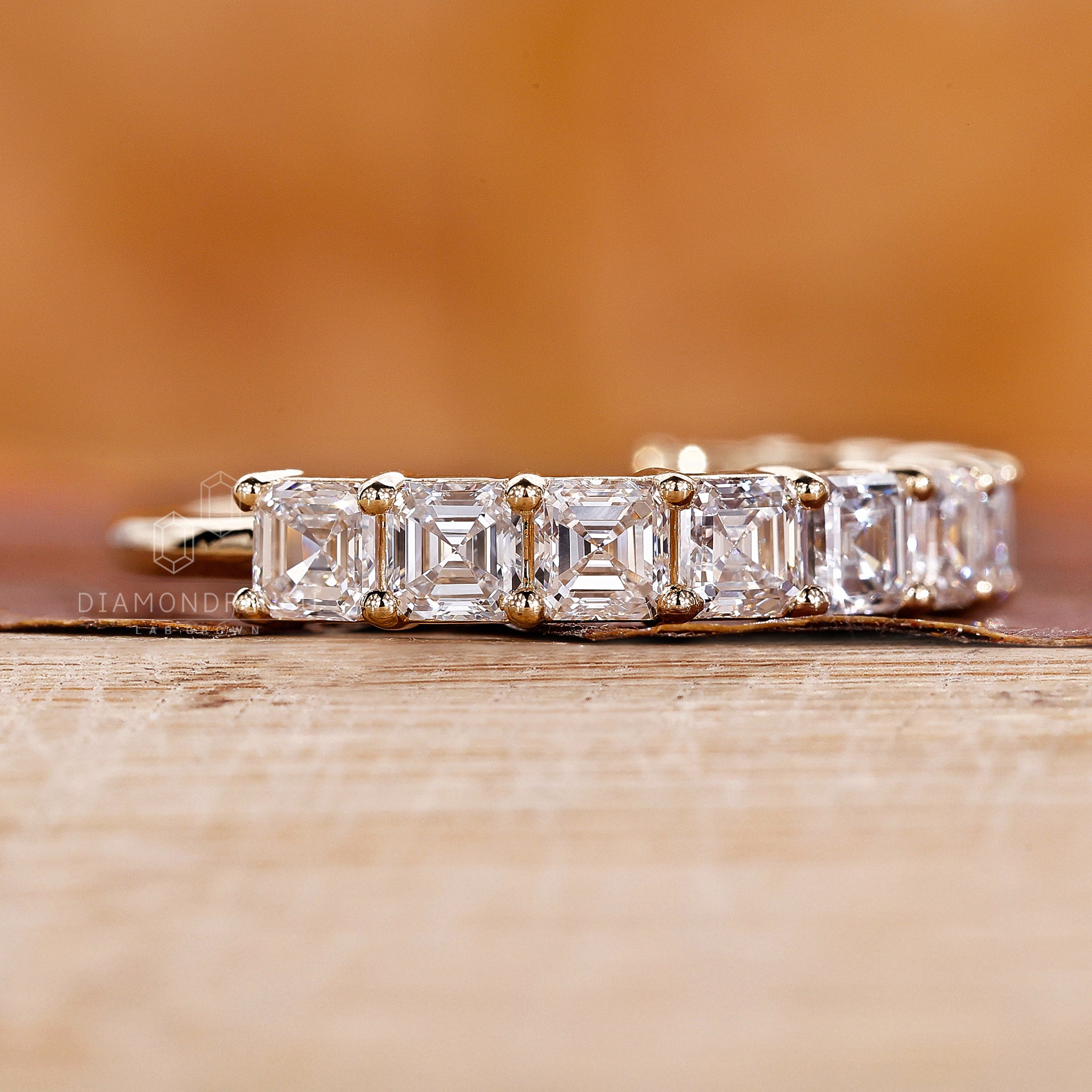 Yellow gold band with Asscher diamonds.
