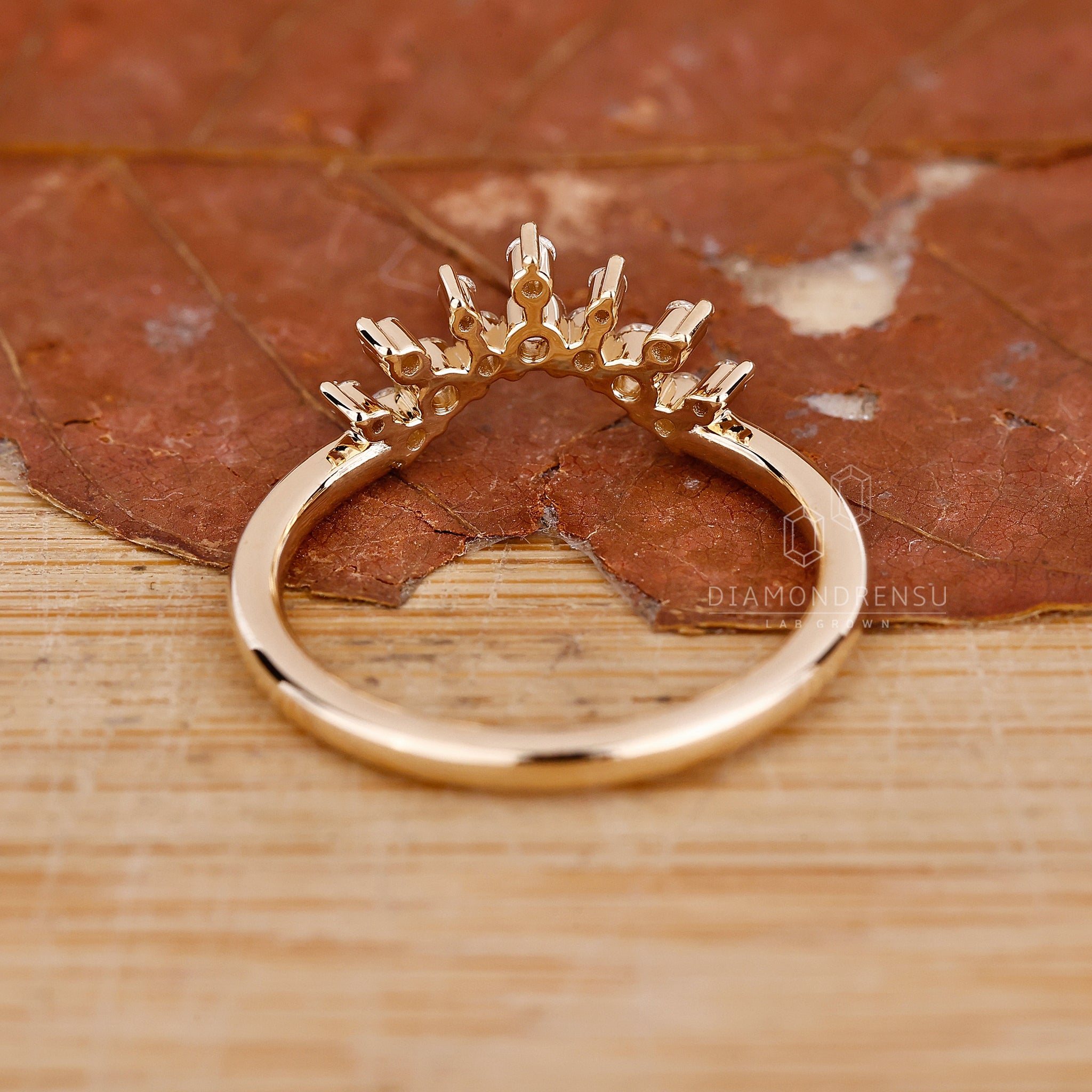 Round diamond wedding band in prong setting
