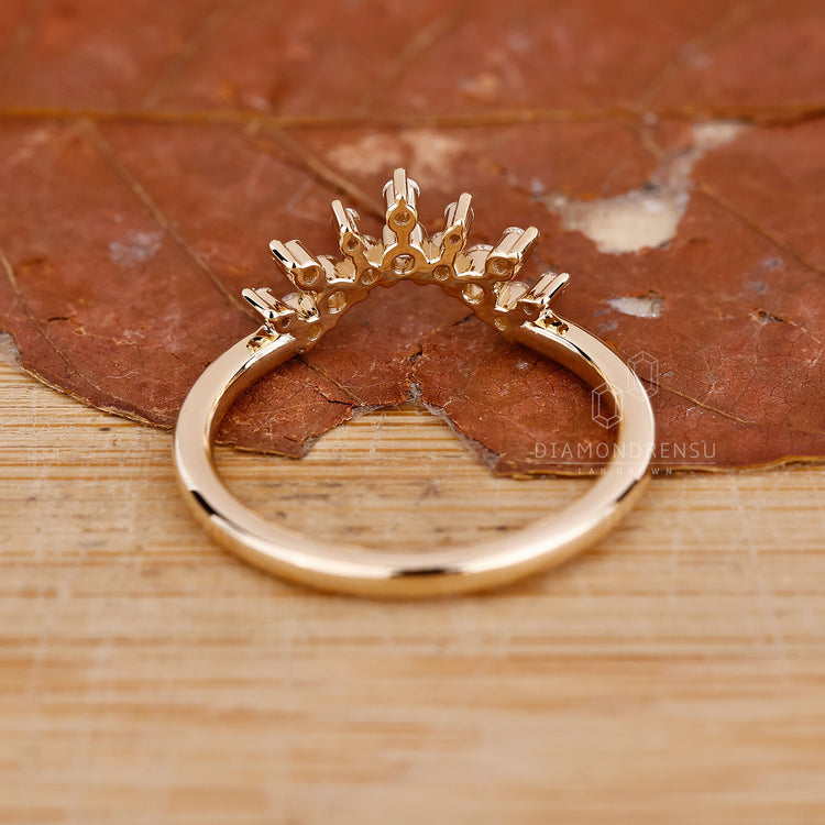 Round diamond wedding band in prong setting
