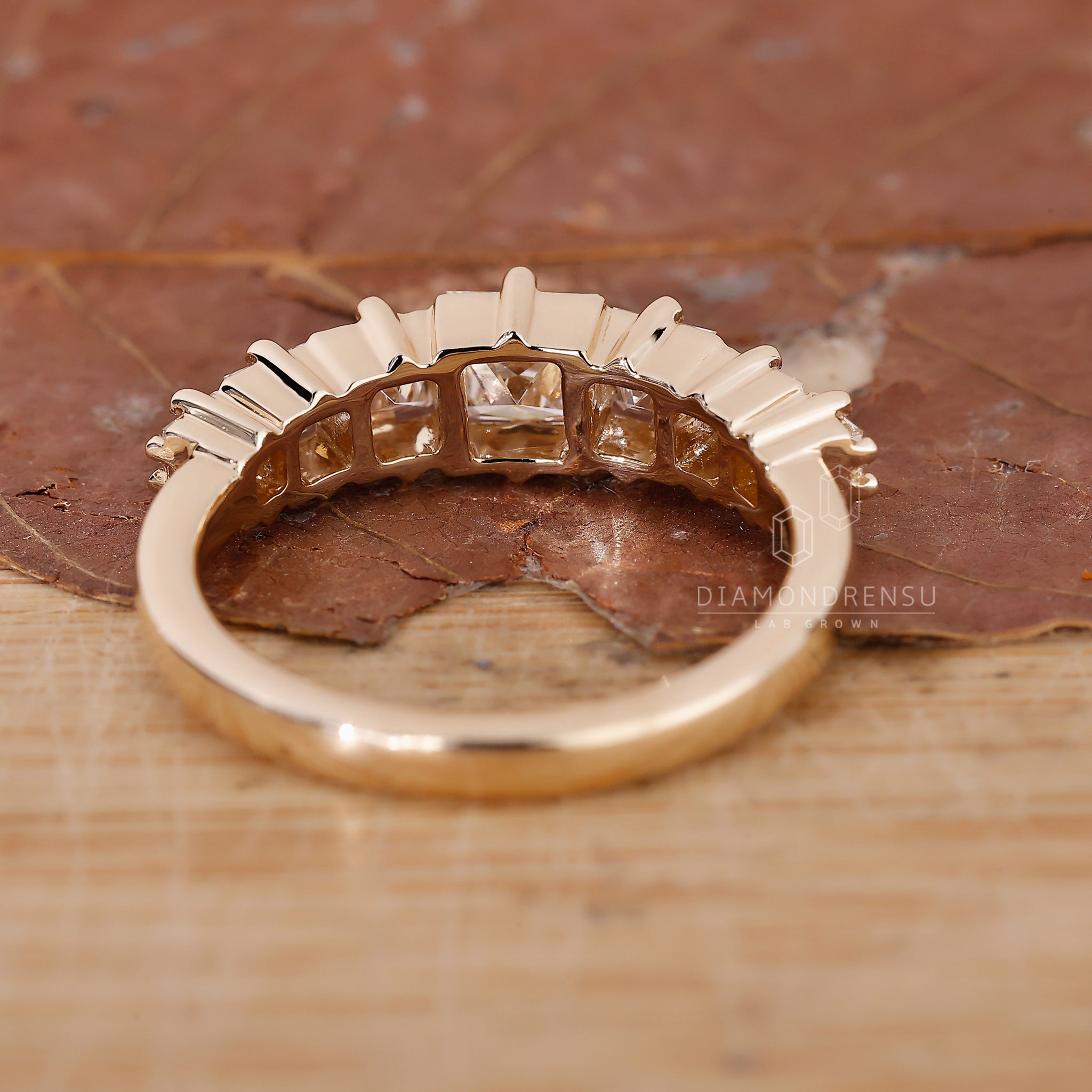 Lab Grown Diamond band crafted in a 7 stone style with prong setting.