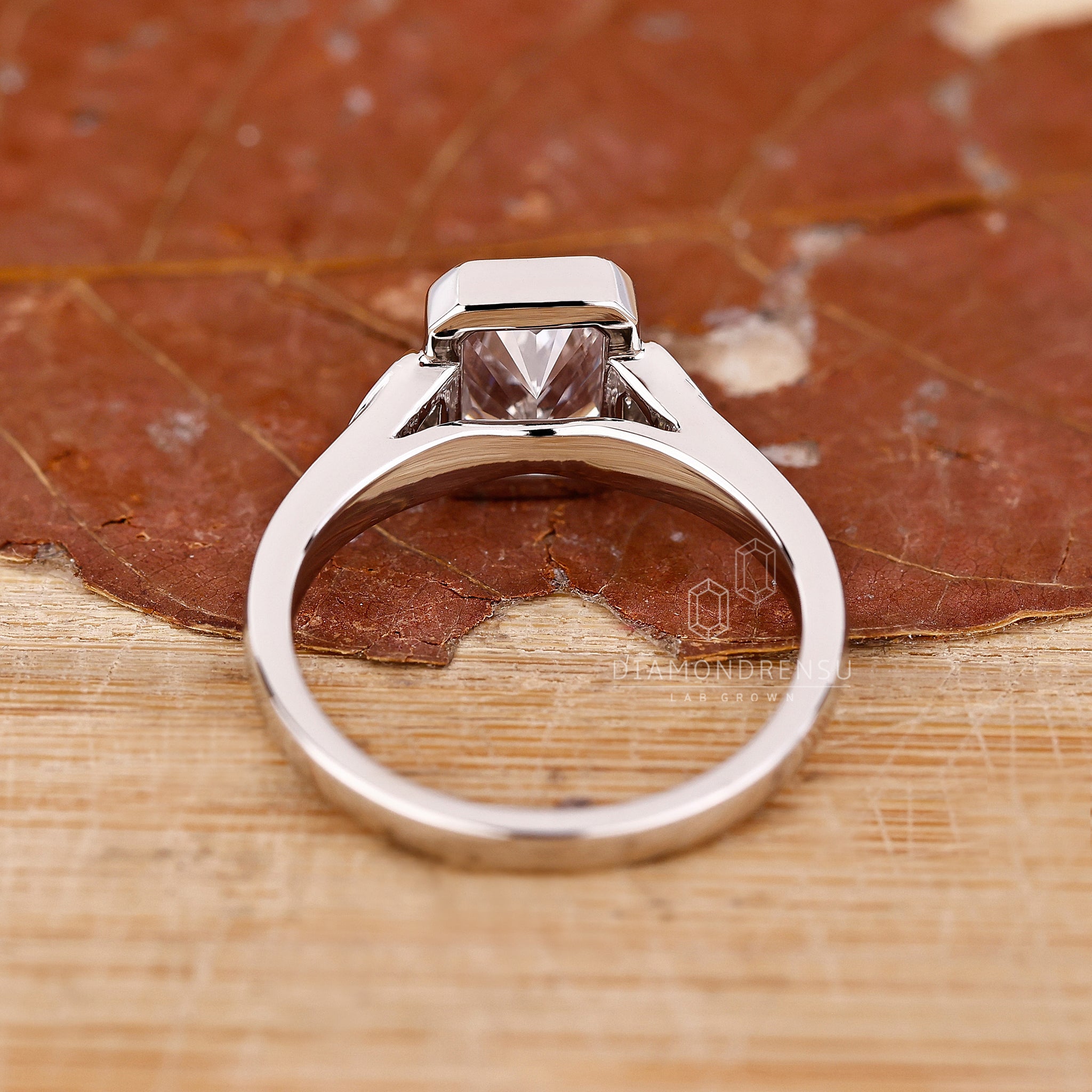 Handmade jewelry with 2 trillion side stones for extra sparkle.
