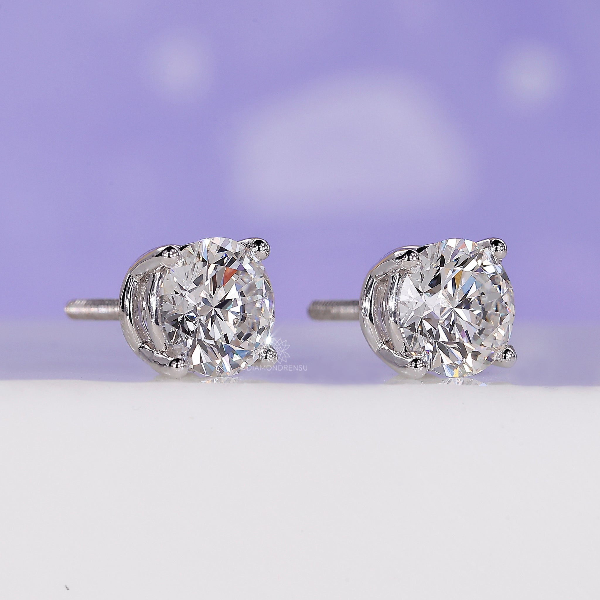 Round cut diamond earrings by Diamondrensu.