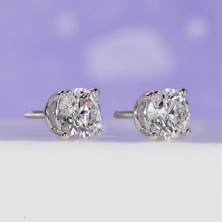Round cut diamond earrings by Diamondrensu.