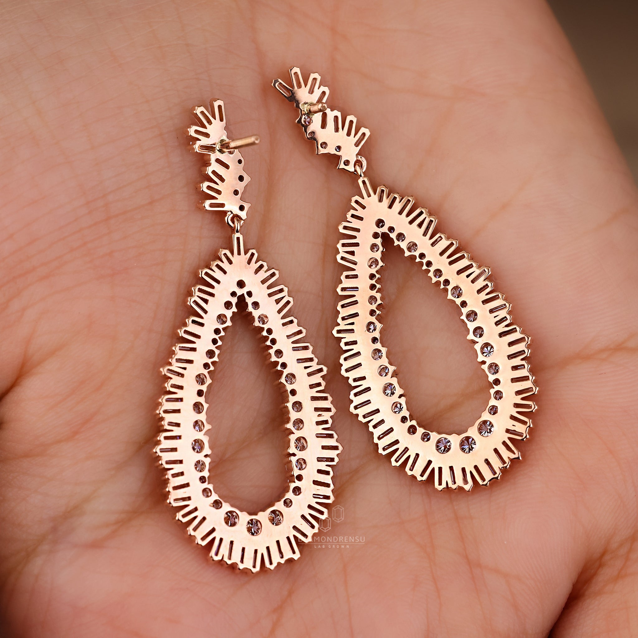 Prong setting earrings with dangle drop style.
