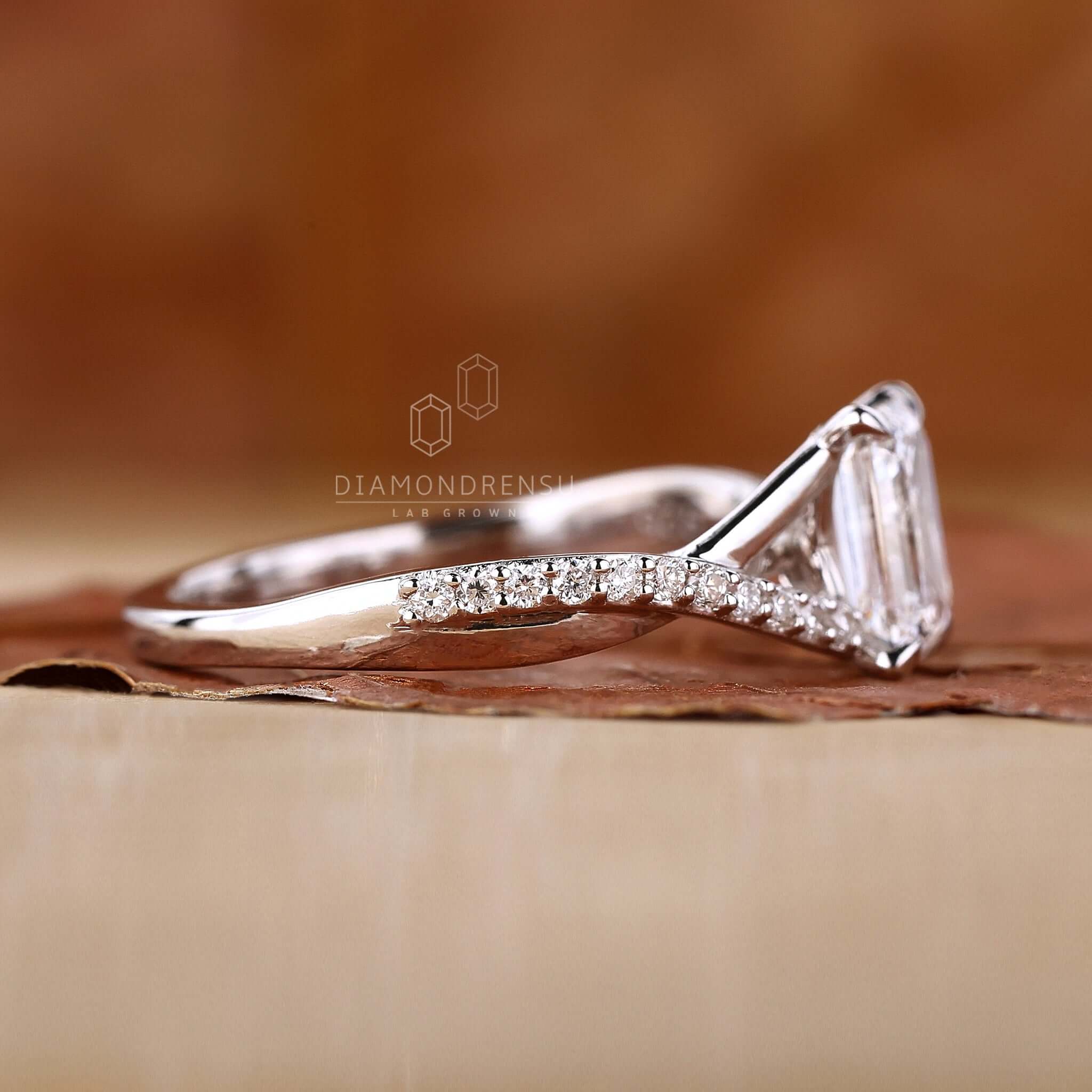 Emerald Cut Engagement Ring with elegant symmetry for a timeless look.