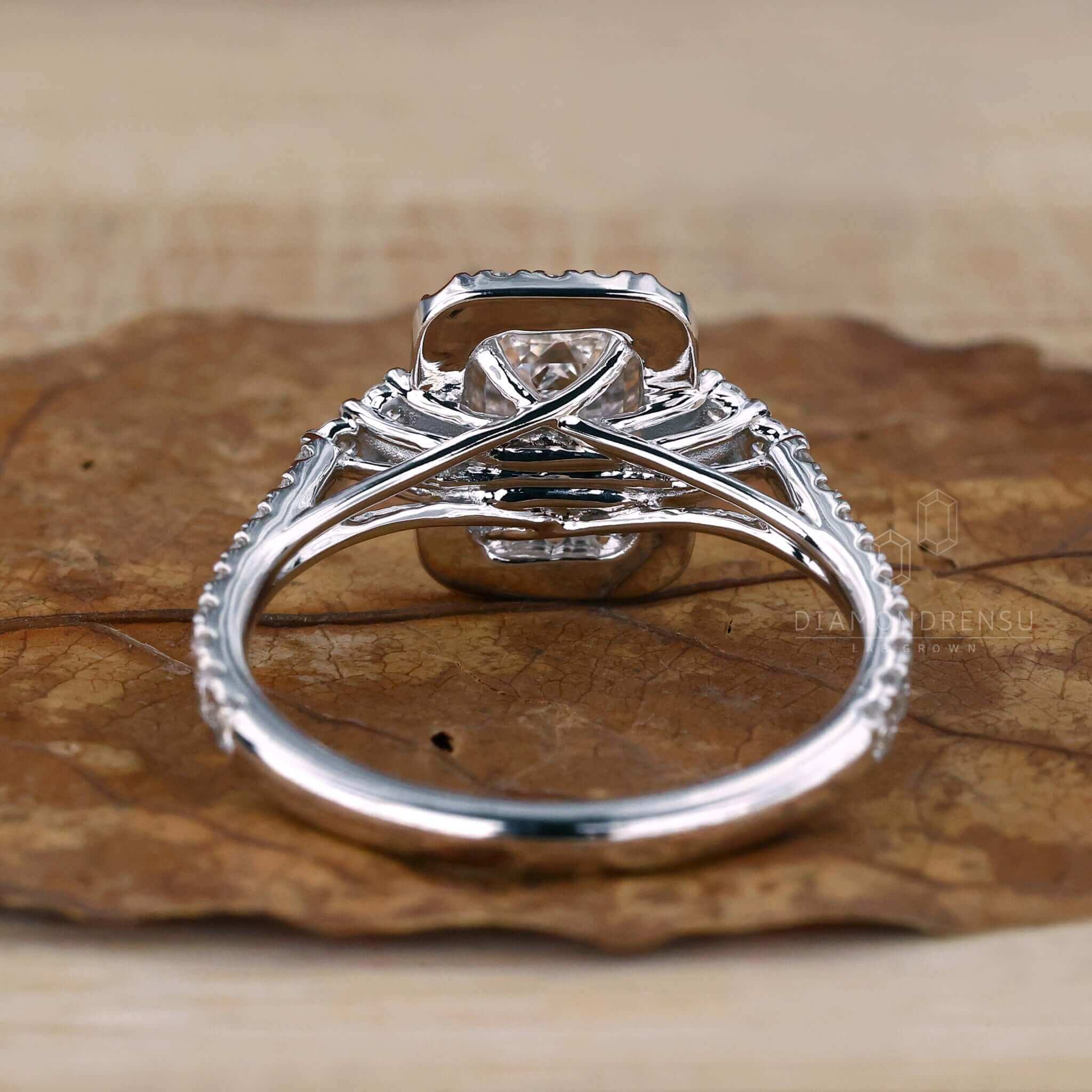 White gold halo engagement ring showcasing elegance.