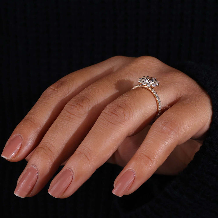 Handmade pave engagement ring with round diamond clusters.