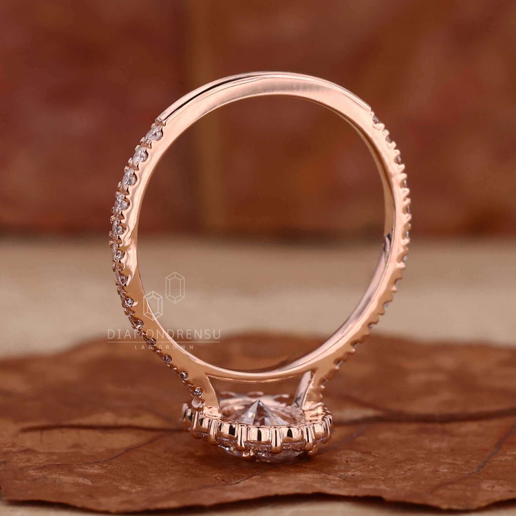 Oval halo diamond ring with a classic touch.