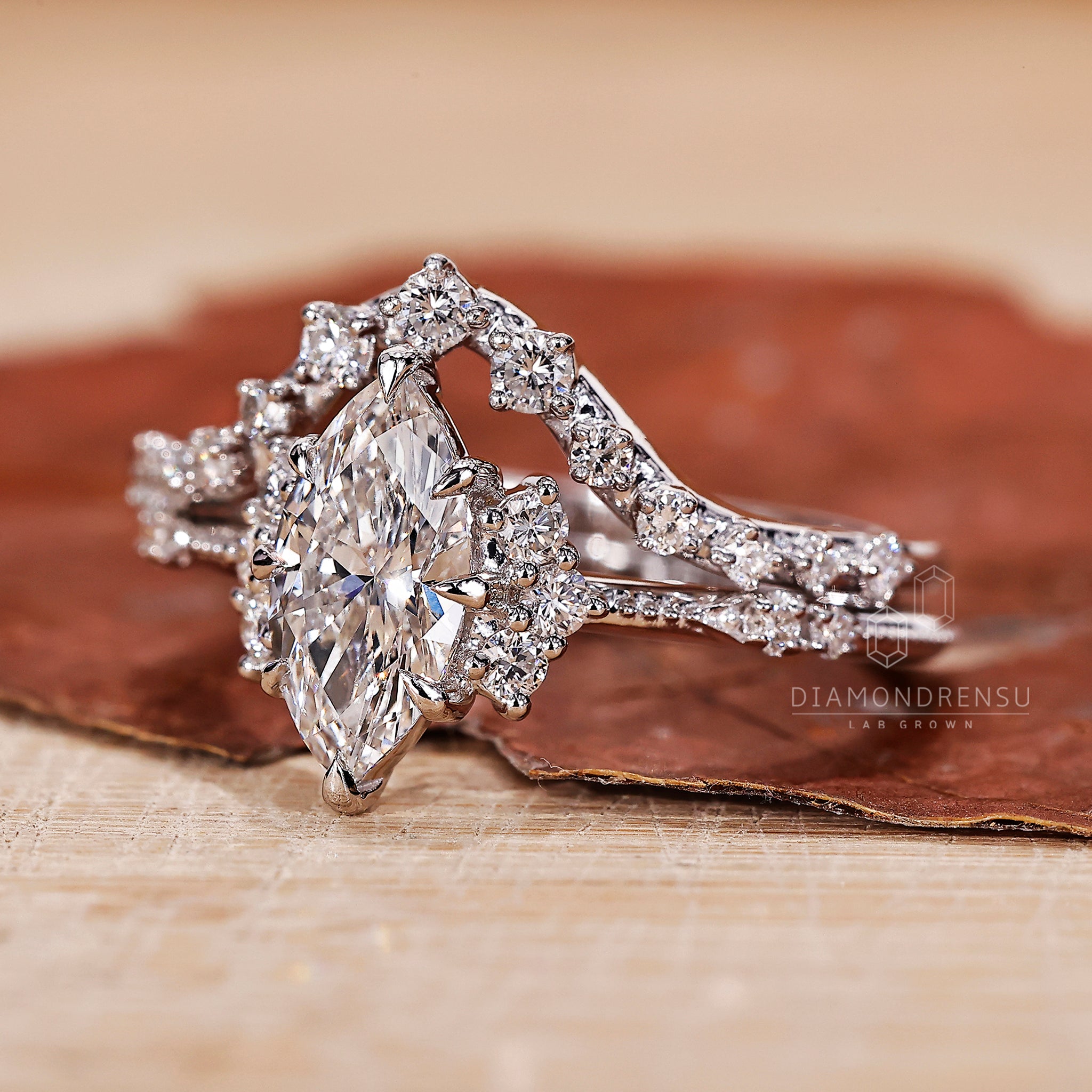 Vintage engagement ring in white gold bridal set with curved wedding band.
