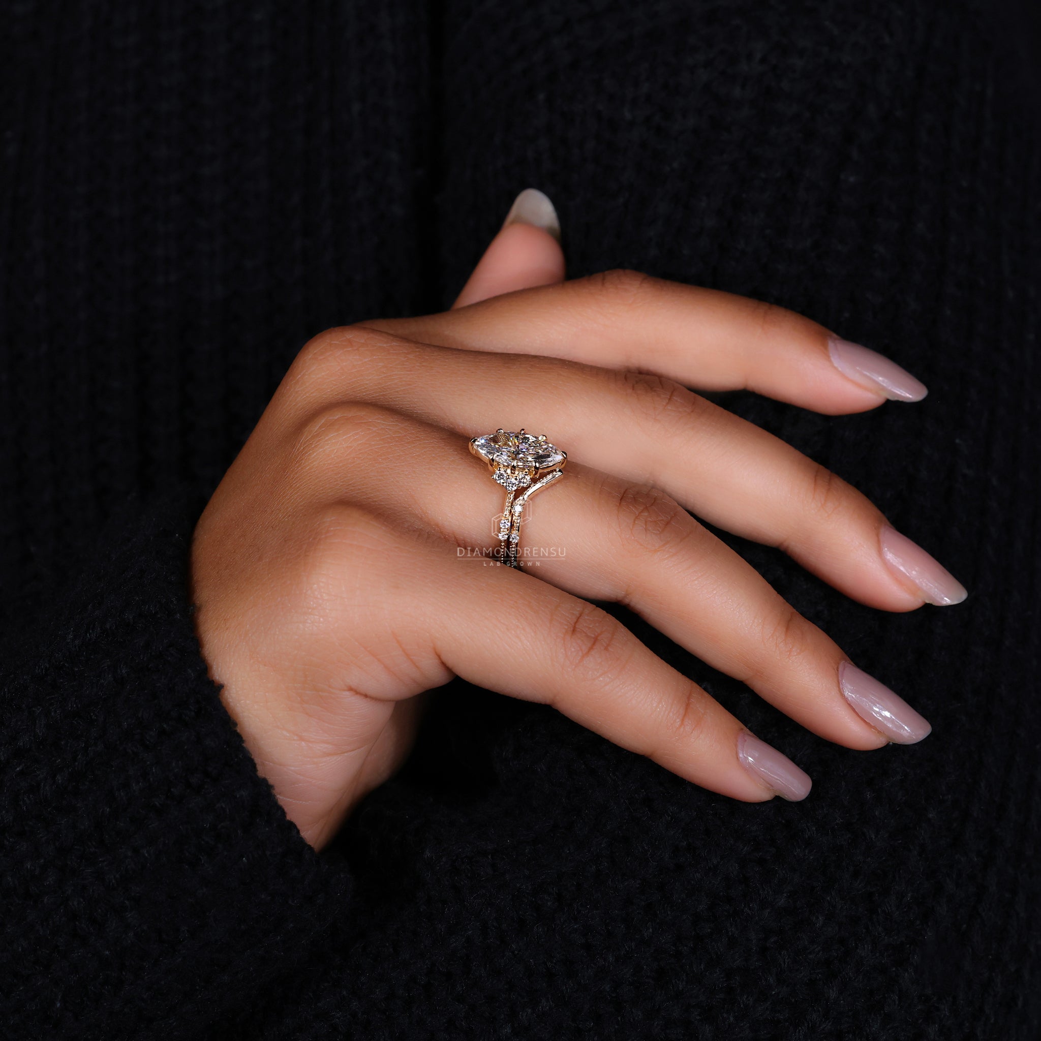 Vintage diamond ring with chevron wedding band in yellow gold bridal set.
