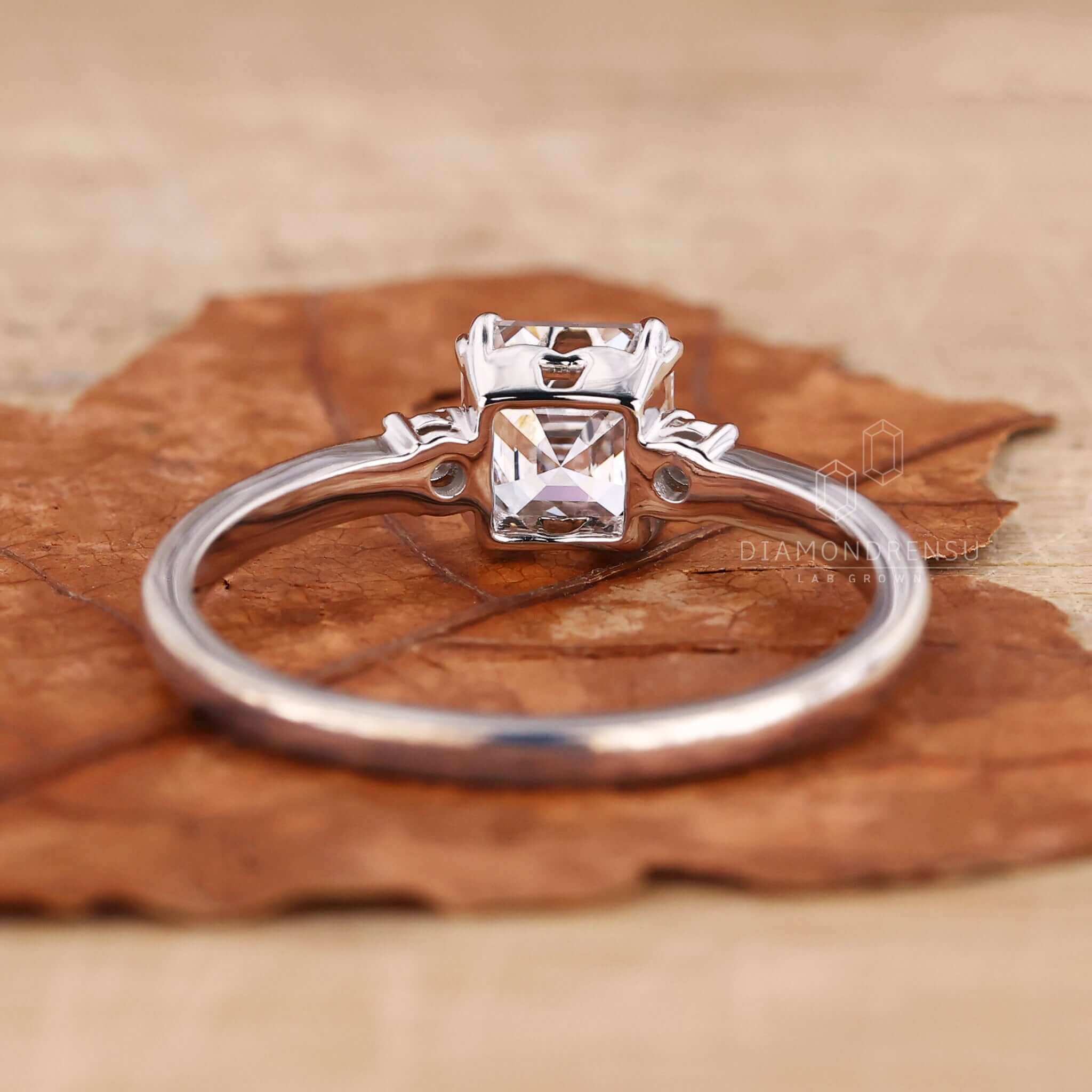 Elegant asscher cut ring for a classic engagement look.