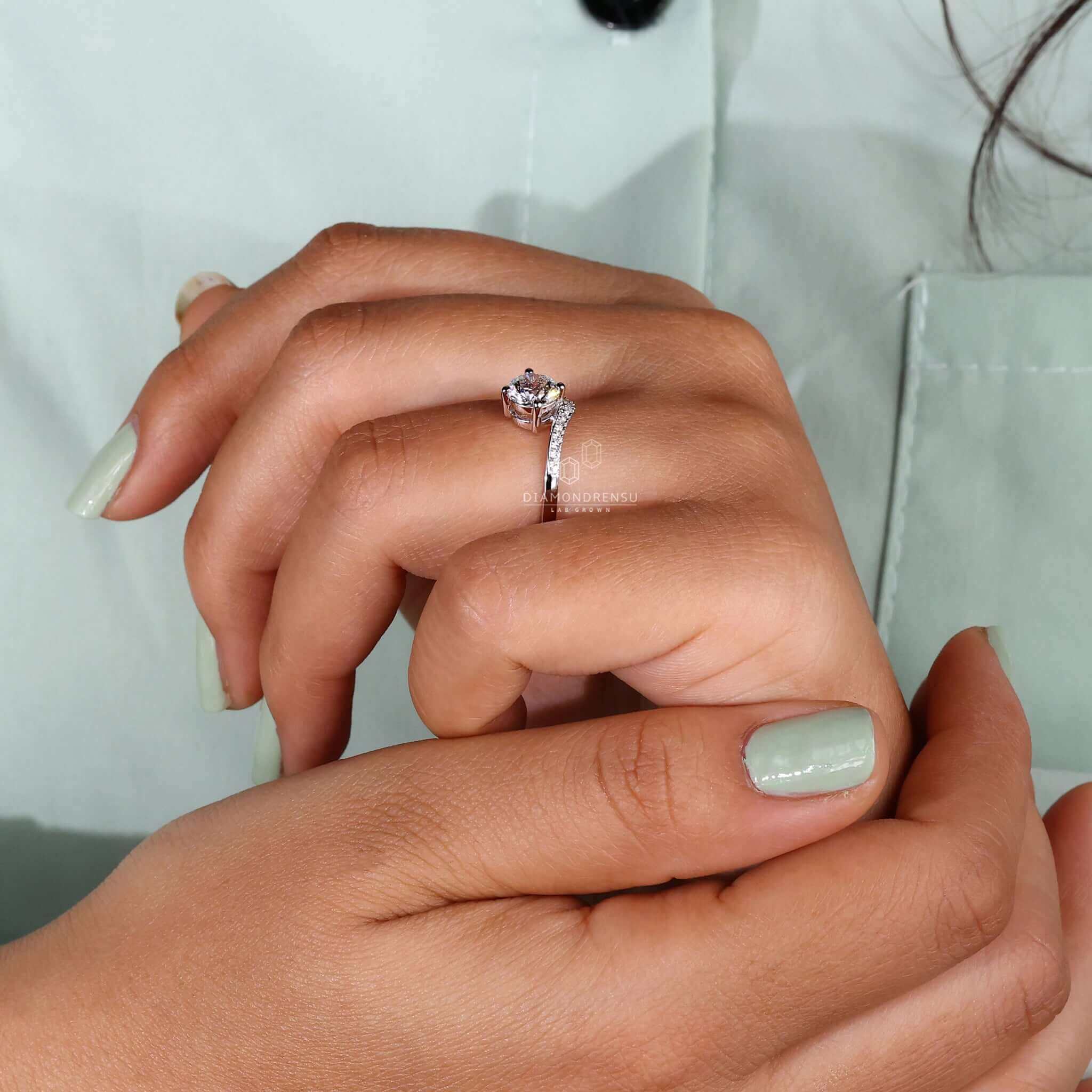 Delicate round diamond gold ring handmade for elegance.