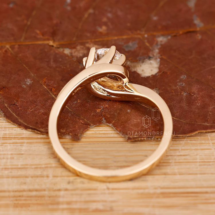 Buy engagement ring with bypass and solitaire setting.
