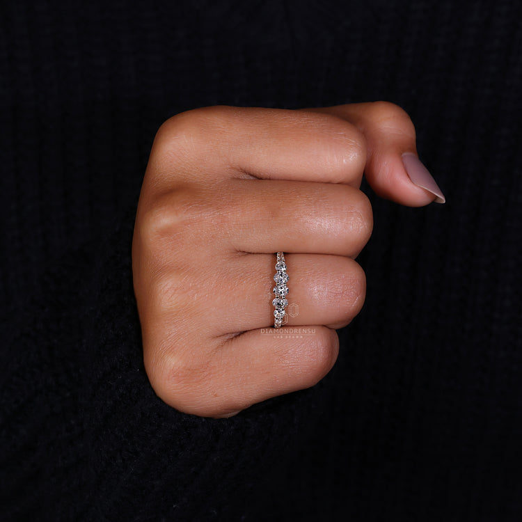 Lab grown diamond wedding band in yellow gold.
