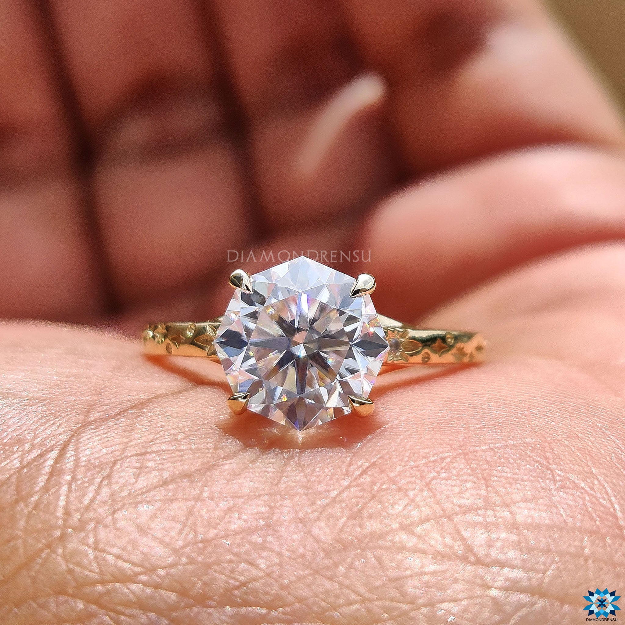Four prong claw setting on octagon moissanite ring.
