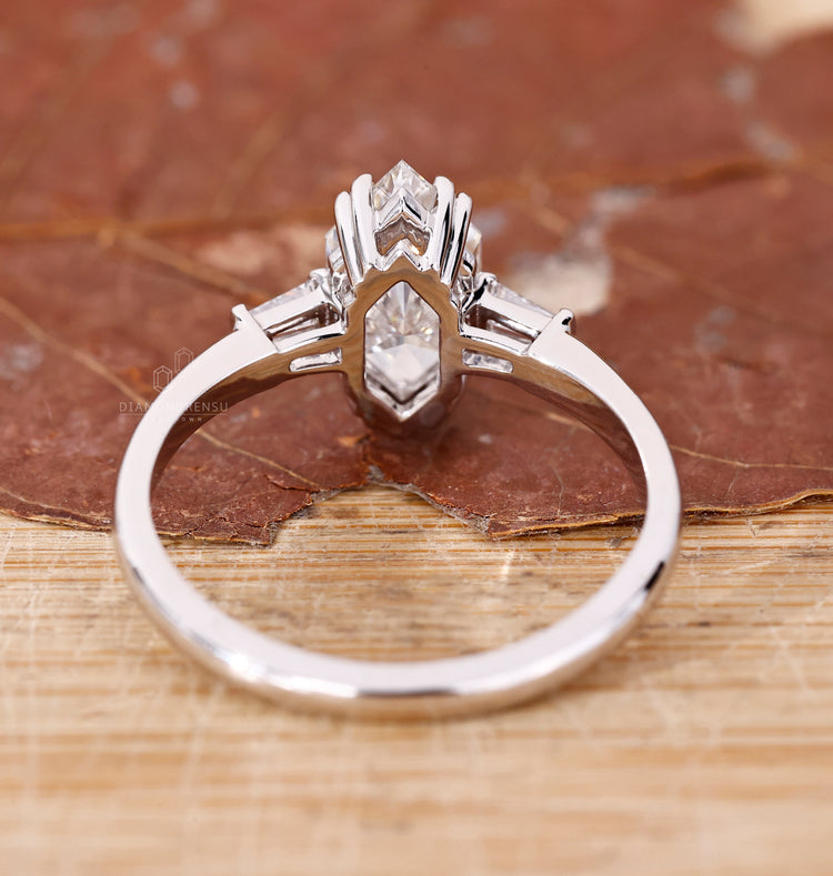 Custom engagement ring in claw prong white gold.
