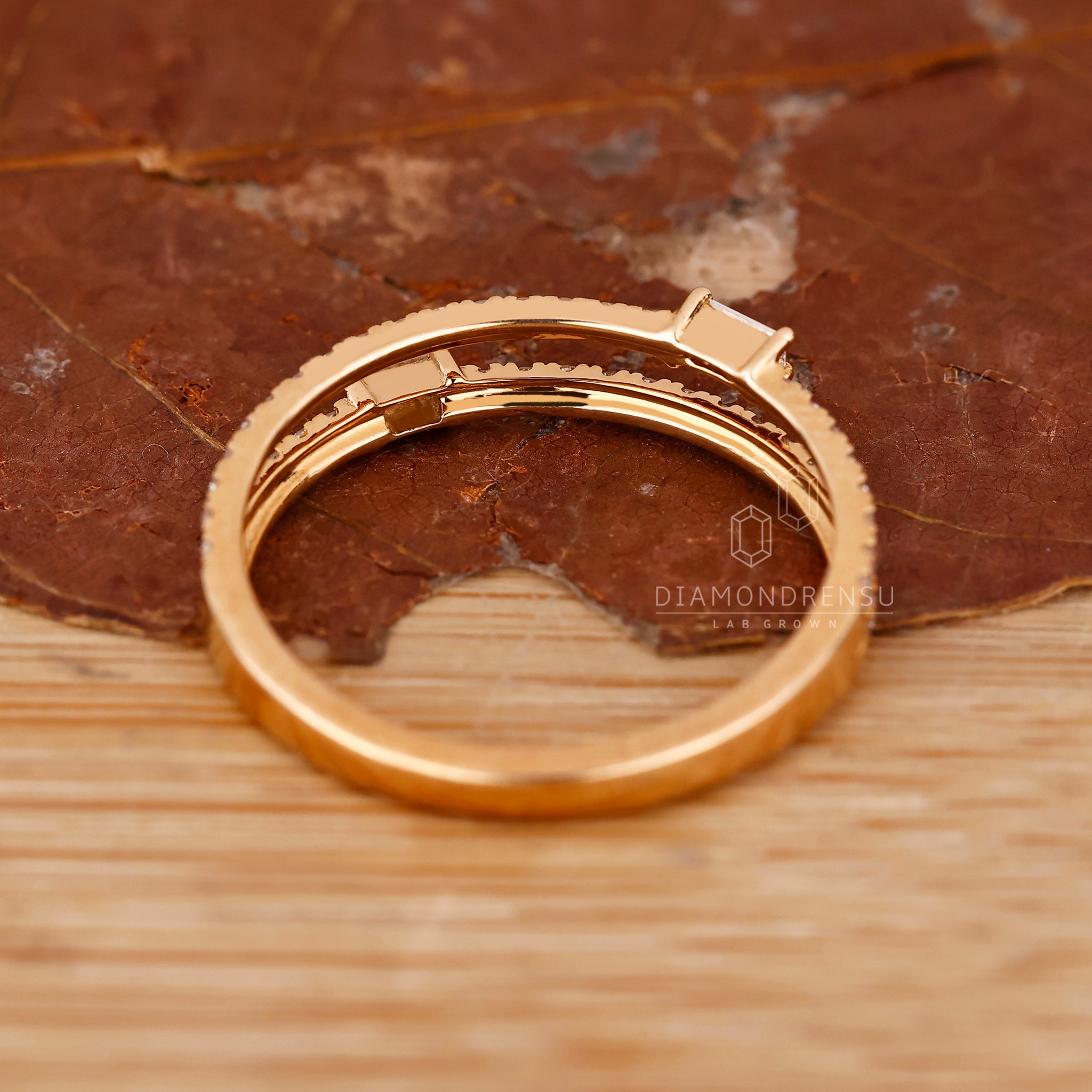 Handmade wedding band with baguette and round accents.
