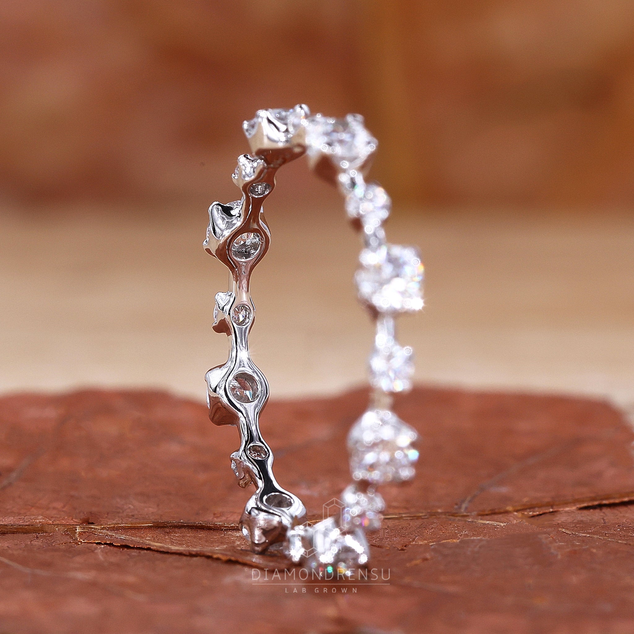 Eternity wedding band featuring lab grown round diamonds
