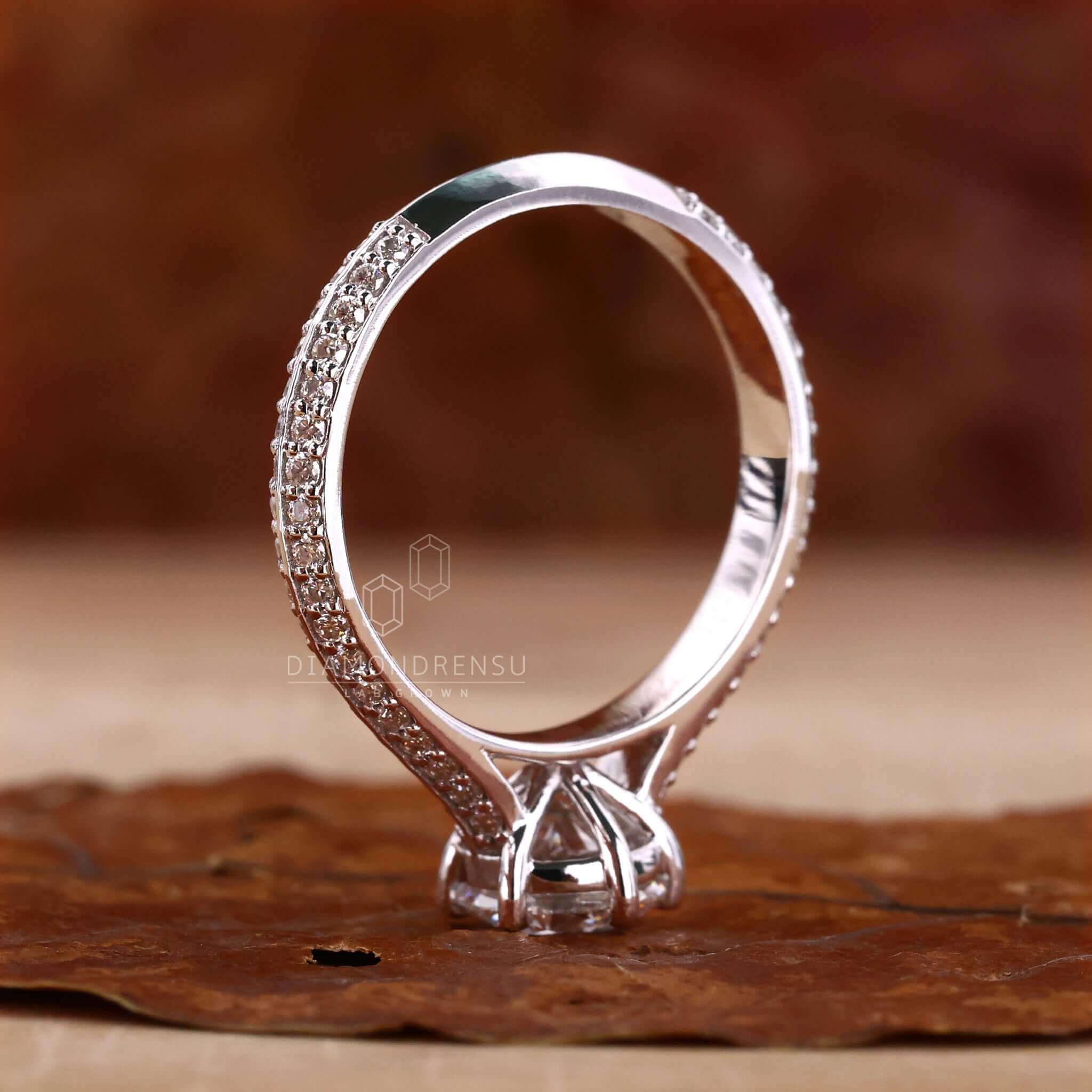 Round engagement ring with a white gold band and a six prong diamond ring for added durability and beauty.
