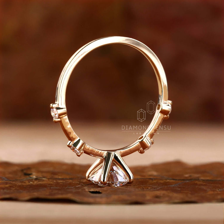 Round engagement ring crafted in the UK with a 4 prong ring setting and Lab Grown Diamond for added brilliance.
