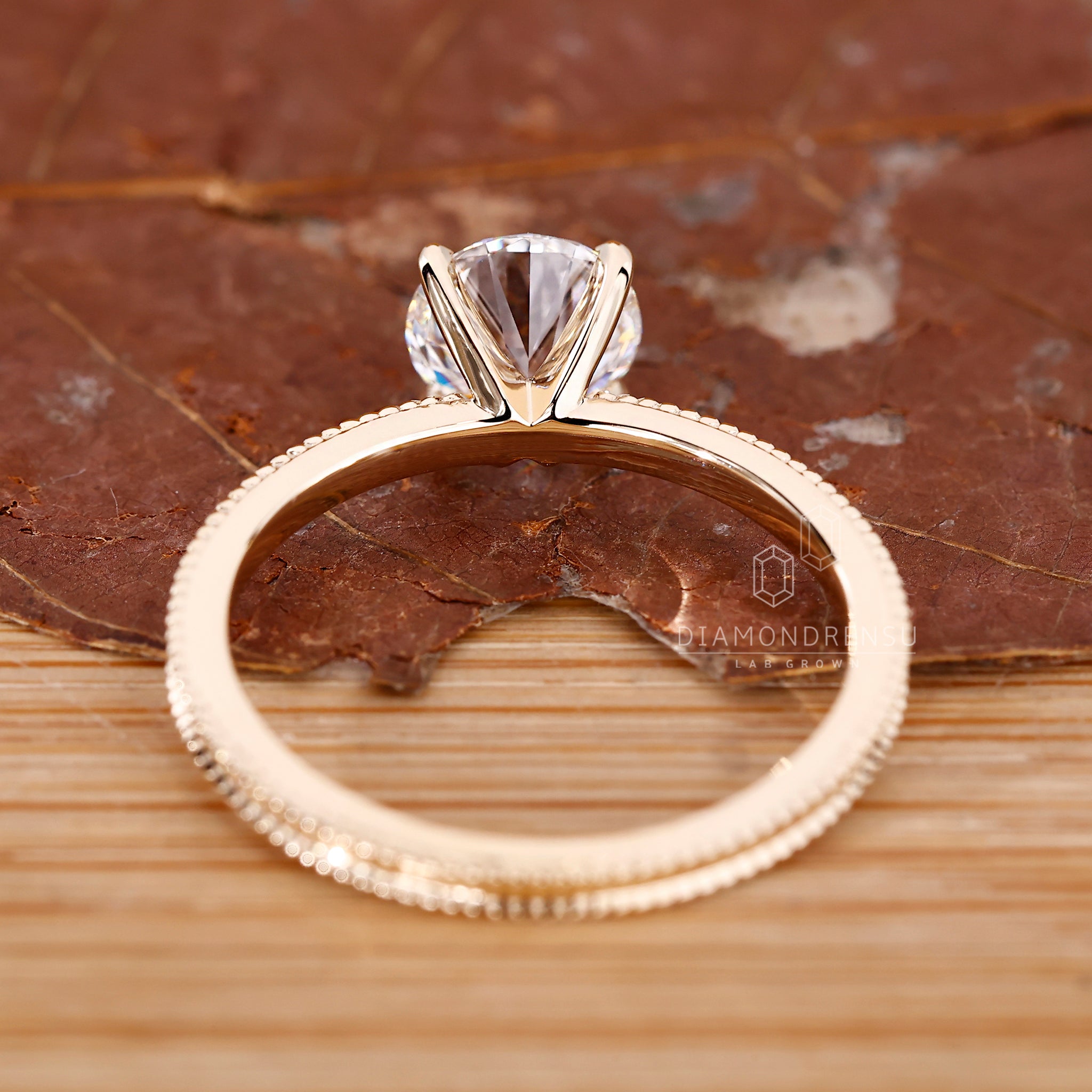 UK engagement ring with round center stone