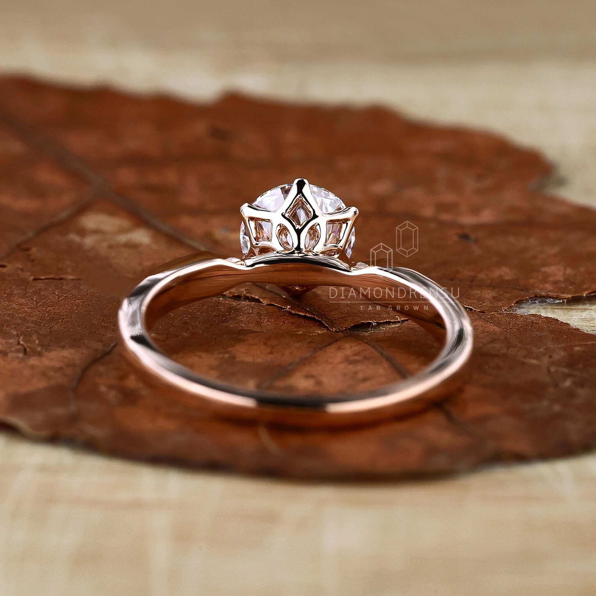 Round solitaire engagement ring designed for a modern romantic touch.