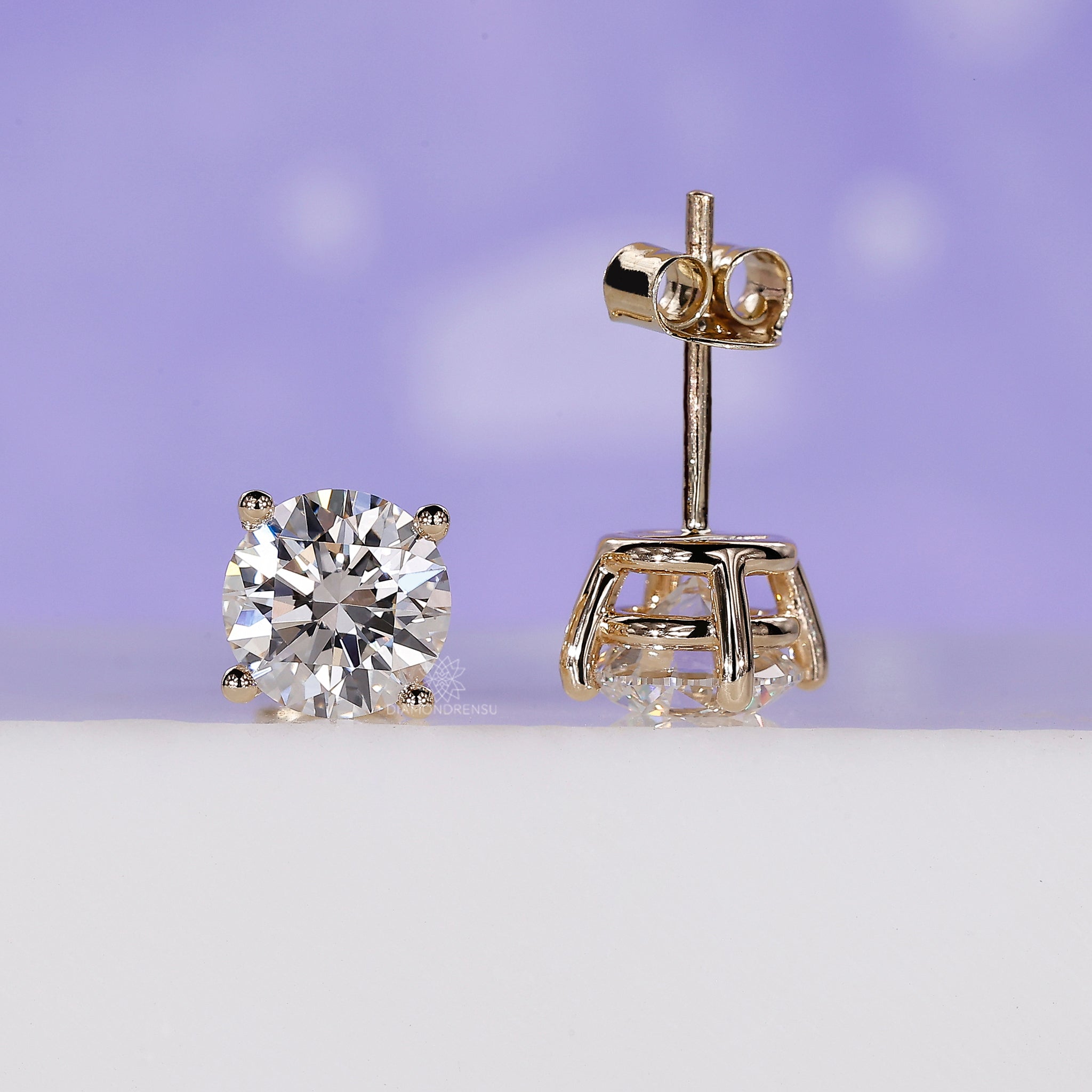 2.20 carat total weight diamond studs.